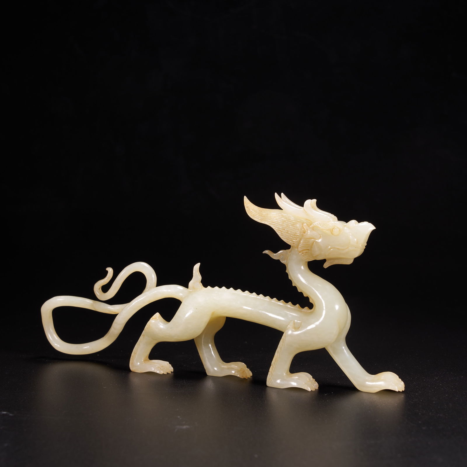 A HIGH-ANTIQUITY JADE DRAGON ORNAMENT: High-Antiquity Jade Dragon Ornament