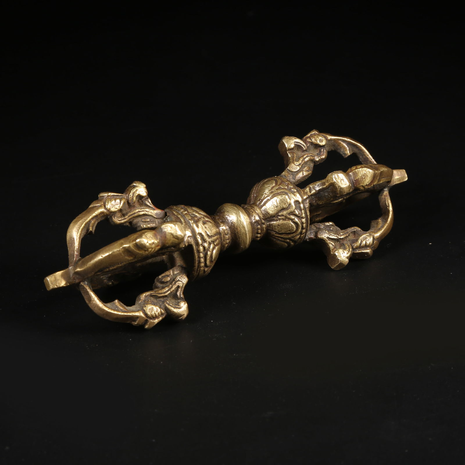 A GILT-BRONZE VAJRA (1 of 7)