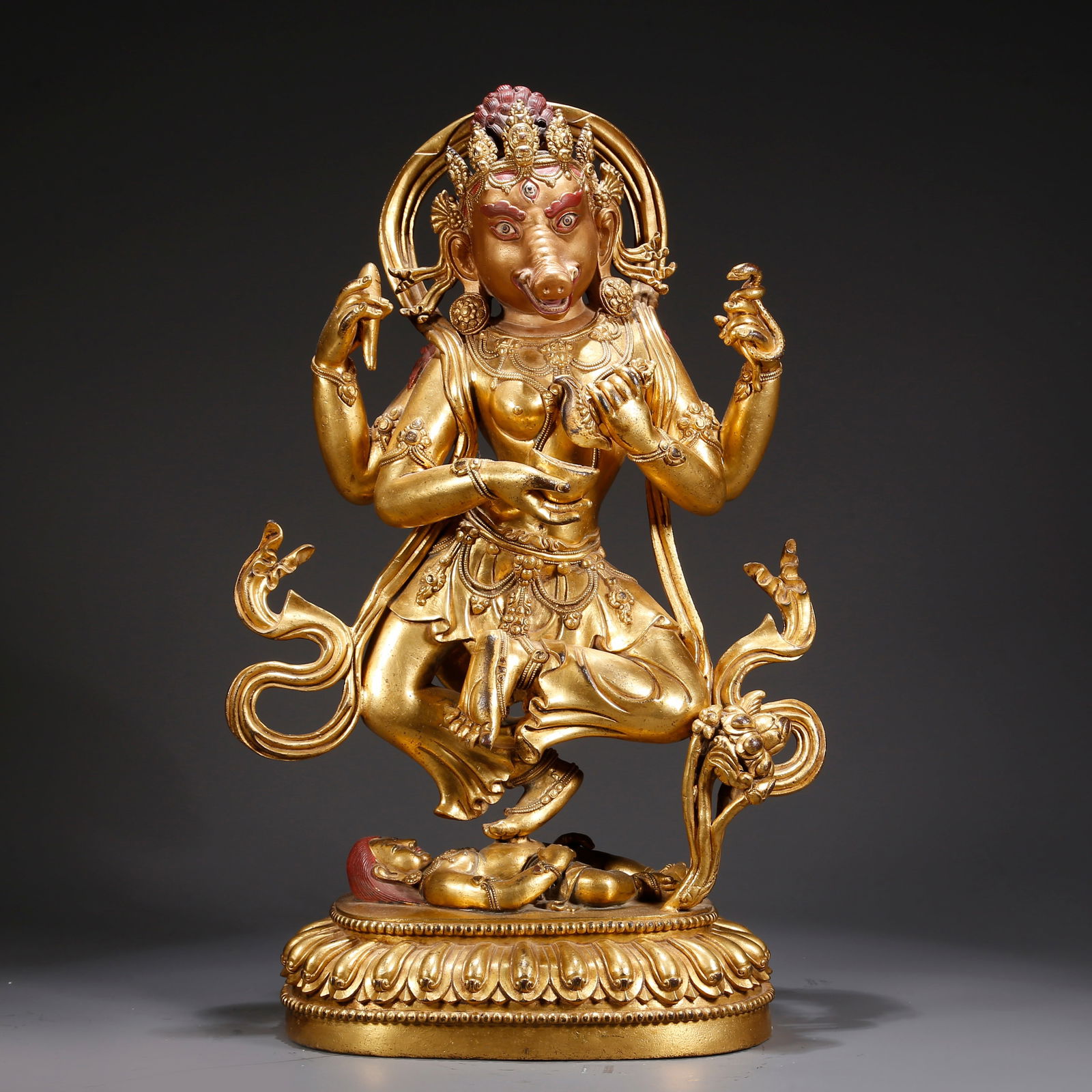 A GILDED BRONZE ELEPHANT-TRUNK GOD OF WEALTH STATUE (1 of 9)