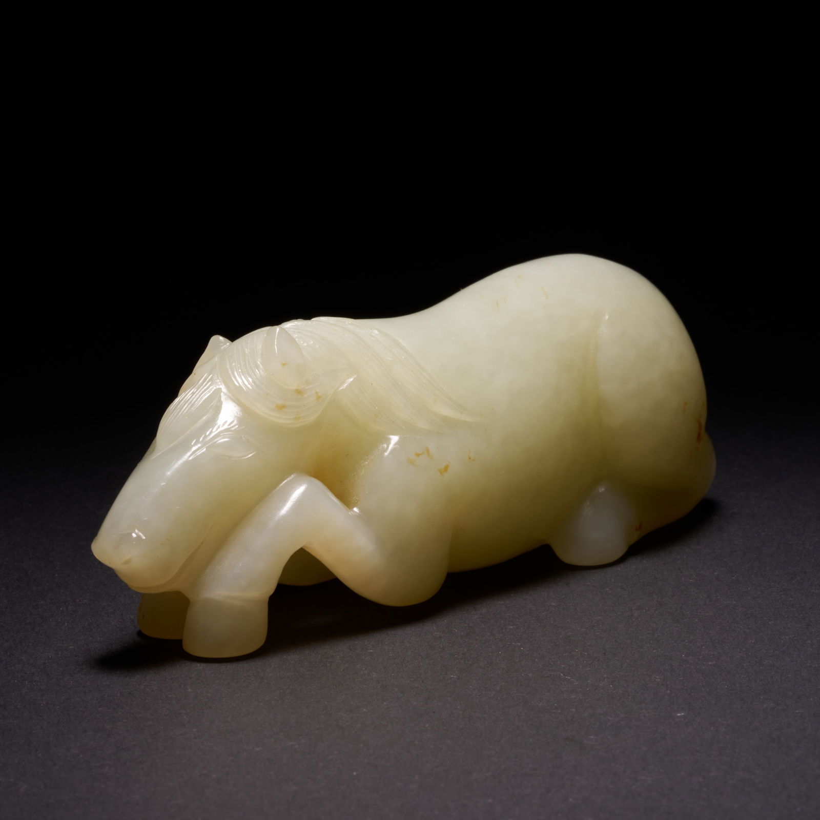 A HETIAN JADE RECLINING HORSE HAND-HELD CARVING, QING DYNASTY (1 of 8)