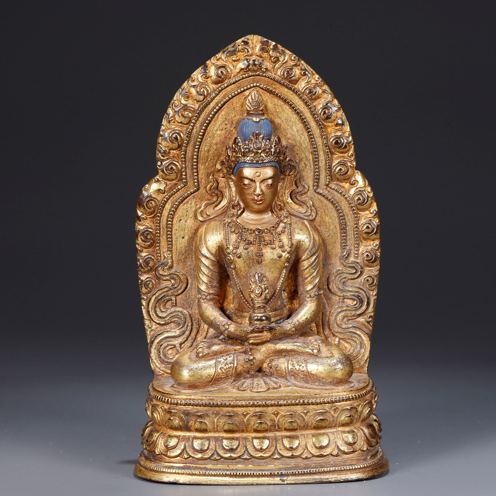 A GILT BRONZE STATUE OF AMITAYUS (BUDDHA OF LONG LIFE) (1 of 9)