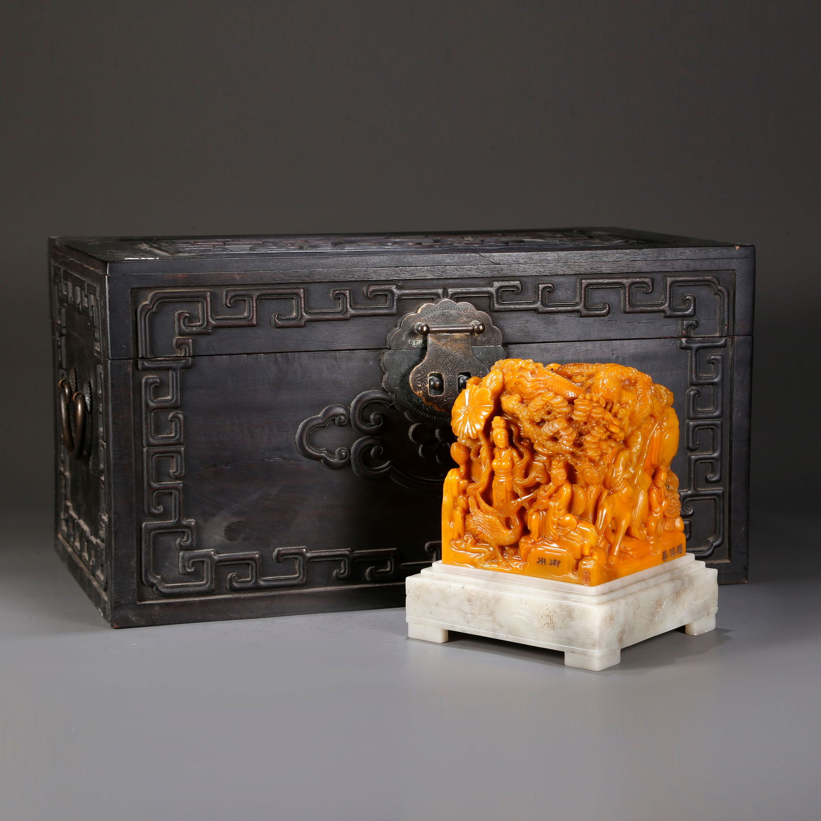 A SHOUSHAN TIANHUANG STONE SEAL WITH EIGHT IMMORTALS, DRAGON, AND PHOENIX PATTERNS (1 of 10)