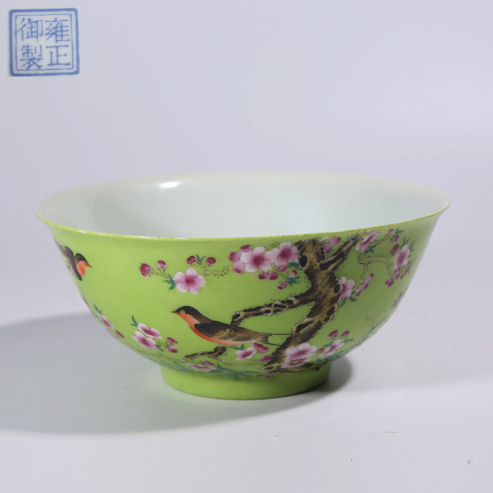 A OLIVE-GREEN GLAZE CLOISONNE ENAMEL BOWL WITH "APRICOT GROVE SPRING SWALLOW" PATTERN: Olive-Green Glaze Cloisonné Enamel Bowl with "Apricot Grove Spring Swallow" Pattern