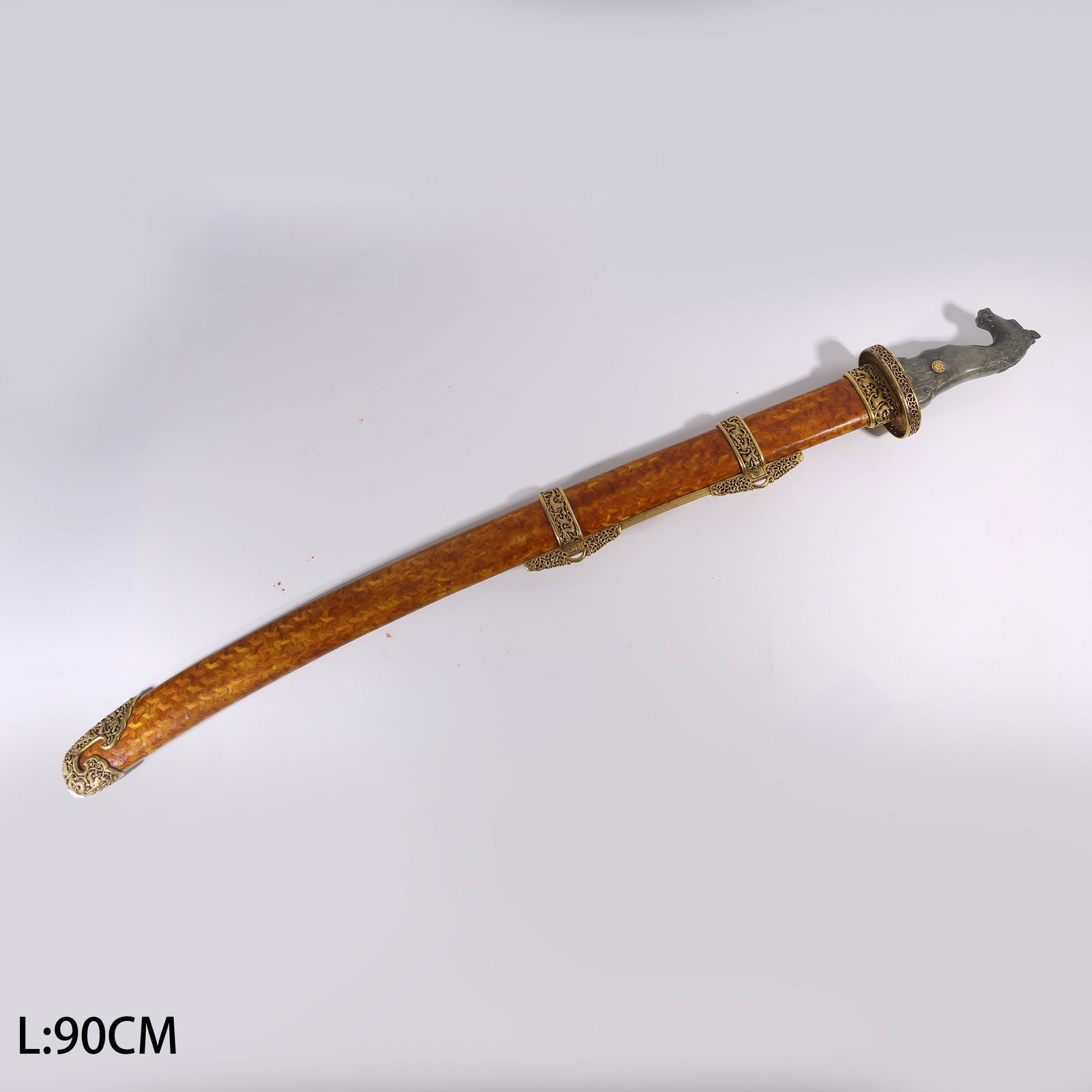 A QING DYNASTY QIANLONG GOLD- AND SILVER-INLAID HETIAN JADE HORSE-HANDLED WAIST SWORD (1 of 11)