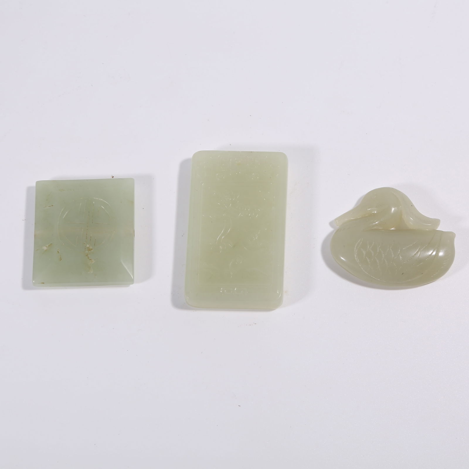 A QING DYNASTY HETIAN JADE, SET (1 of 8)