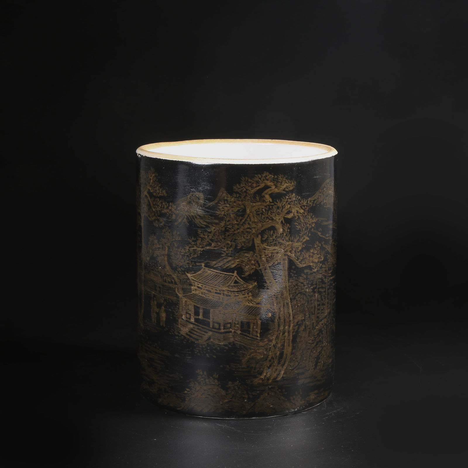 A QING DYNASTY INK-GROUND GILT LANDSCAPE BRUSH POT (1 of 10)