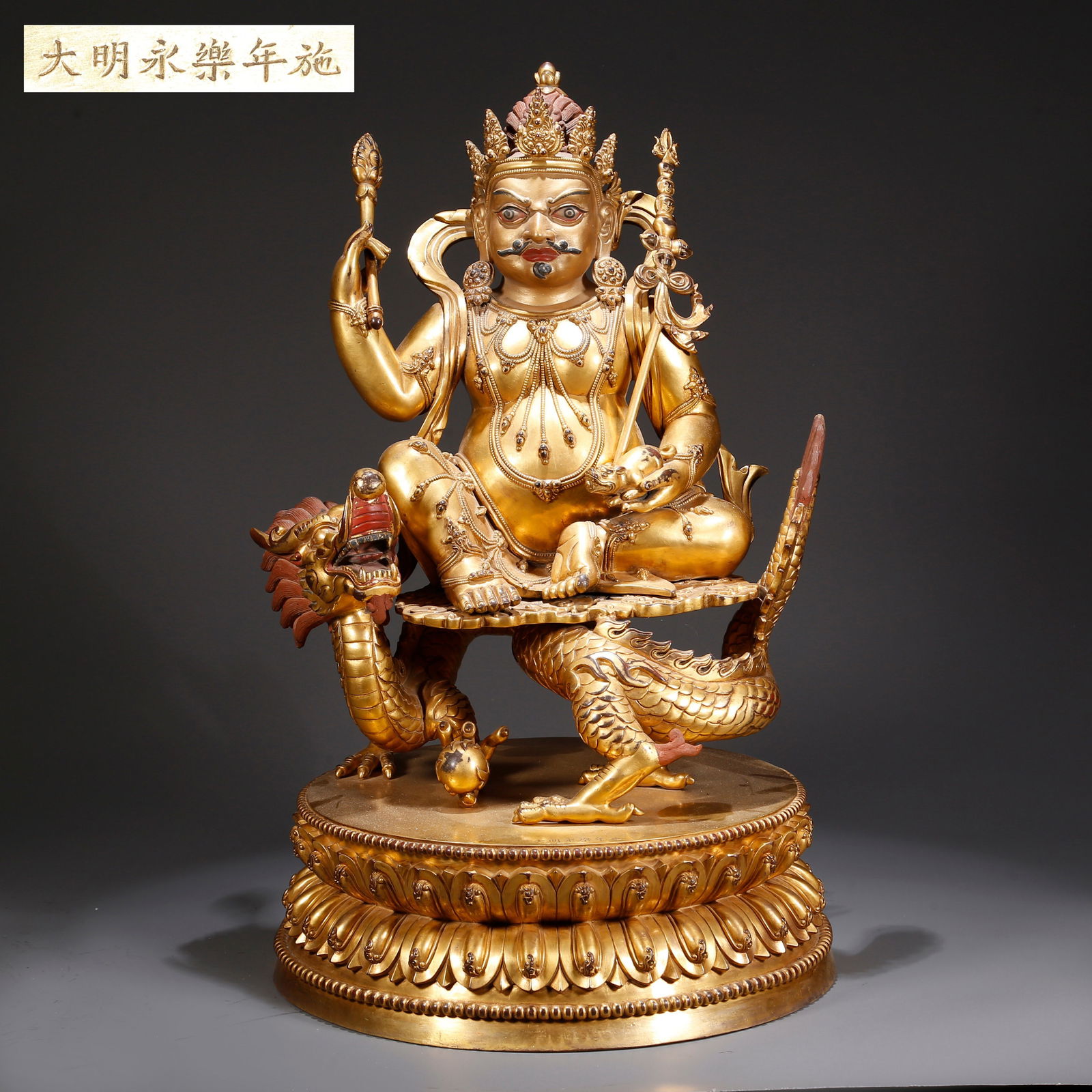 A GILDED BRONZE WATER GOD OF WEALTH STATUE (1 of 10)