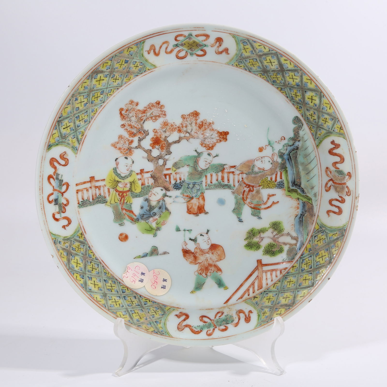 A QING DYNASTY WUCAI PLATE WITH CHILDREN AT PLAY PATTERN (1 of 8)