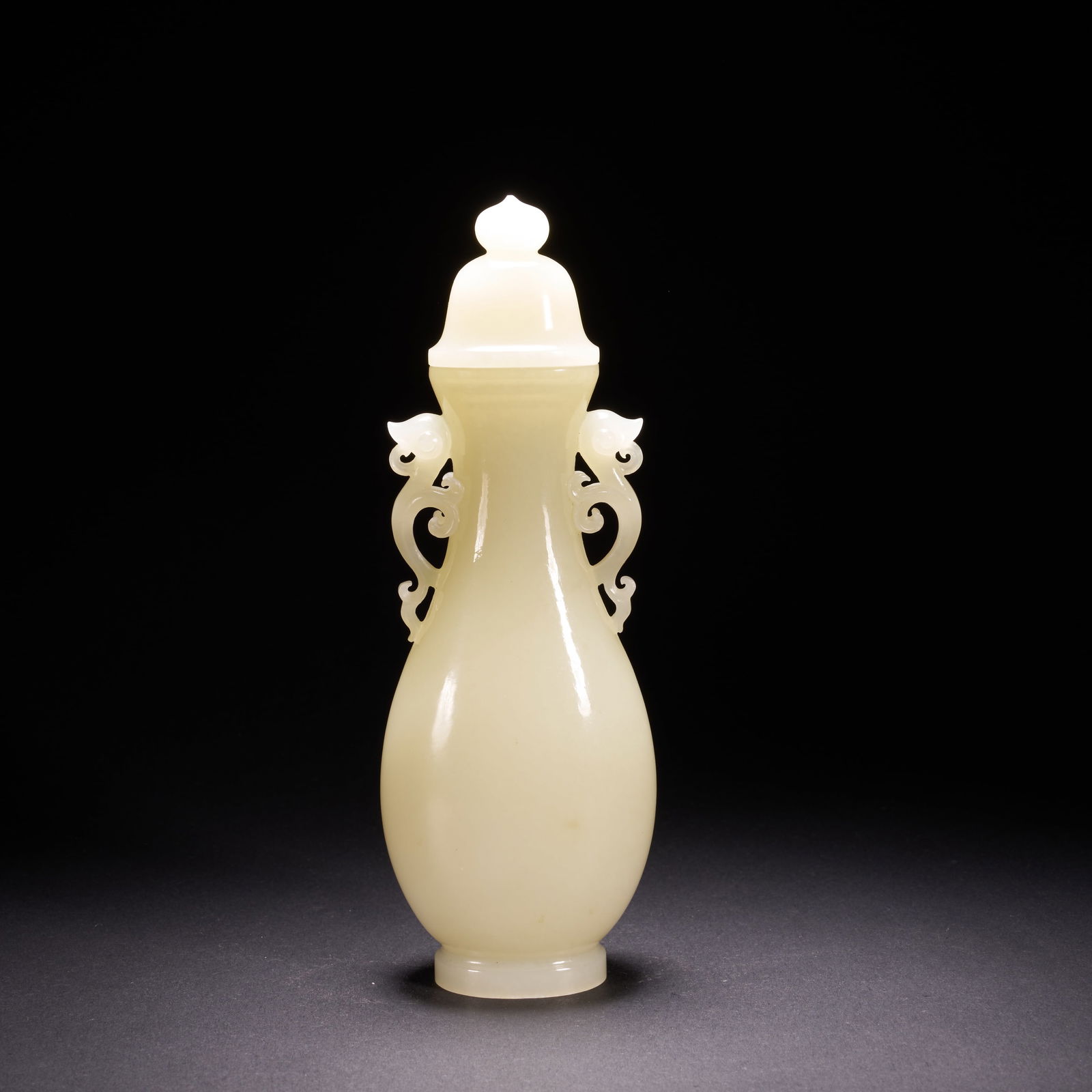 A HETIAN JADE VASE WITH DOUBLE RUYI-SHAPED HANDLES, QING DYNASTY (1 of 8)