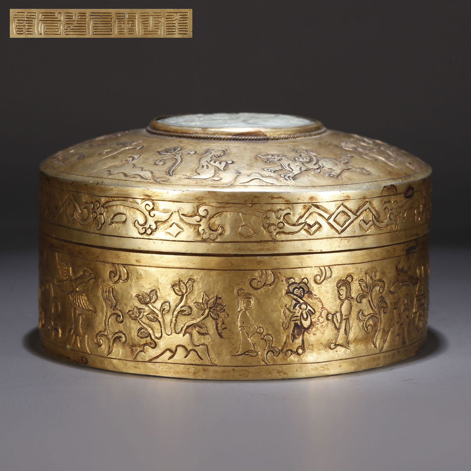 A GILT BRONZE LIDDED BOX WITH FIGURE STORY DESIGN (1 of 10)