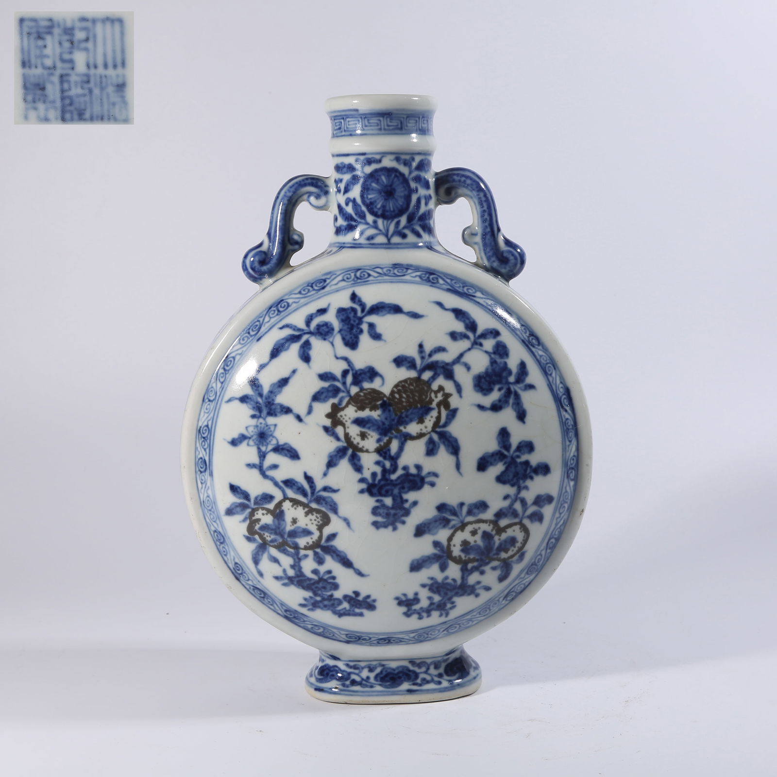 A BLUE-AND-WHITE UNDERGLAZE-RED "THREE ABUNDANCES" PATTERN MOON-EMBRACING VASE WITH RIBBON HANDLES: Blue-and-White Underglaze-Red "Three Abundances" Pattern Moon-Embracing Vase with Ribbon Handles