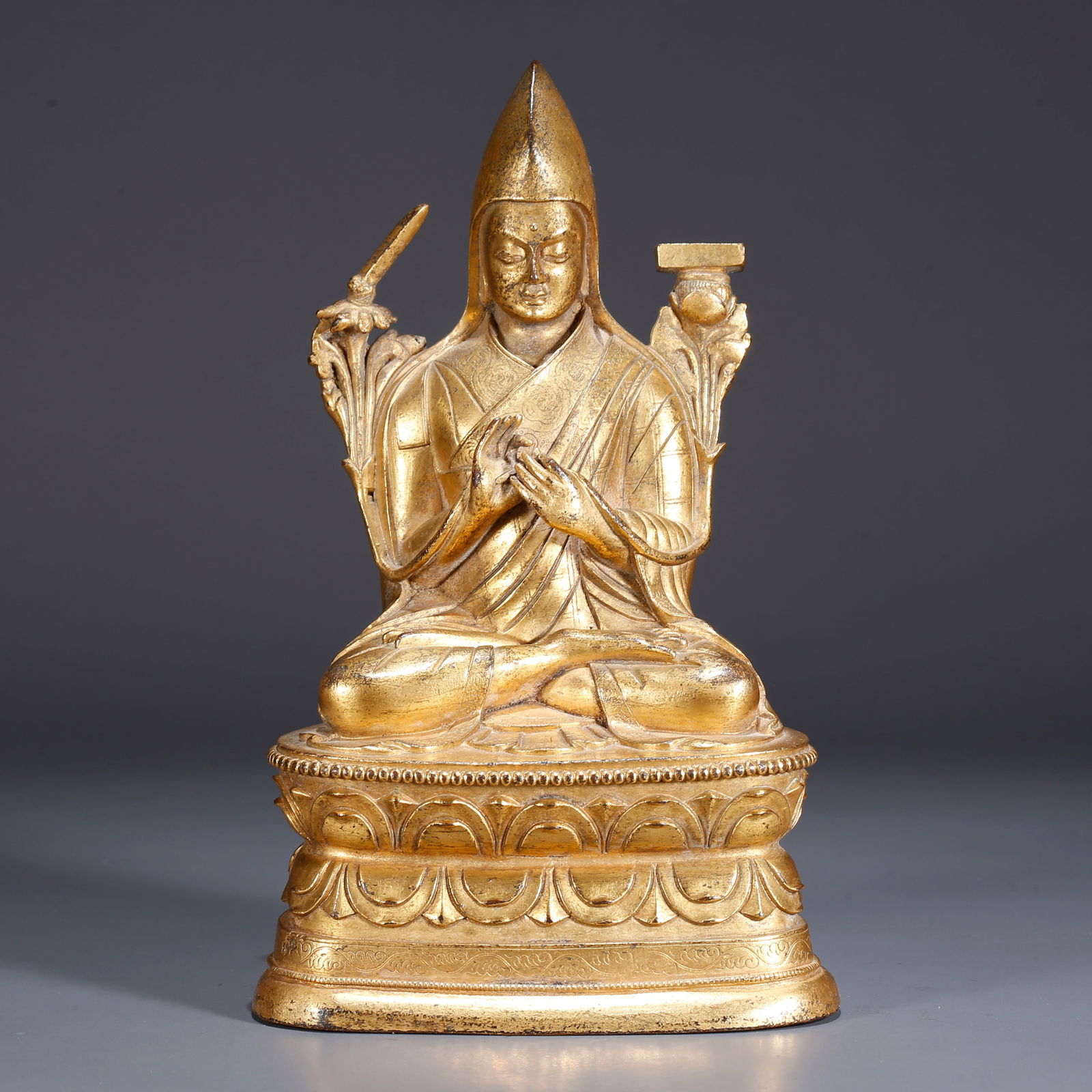 A GILDED BRONZE GURU STATUE (1 of 9)