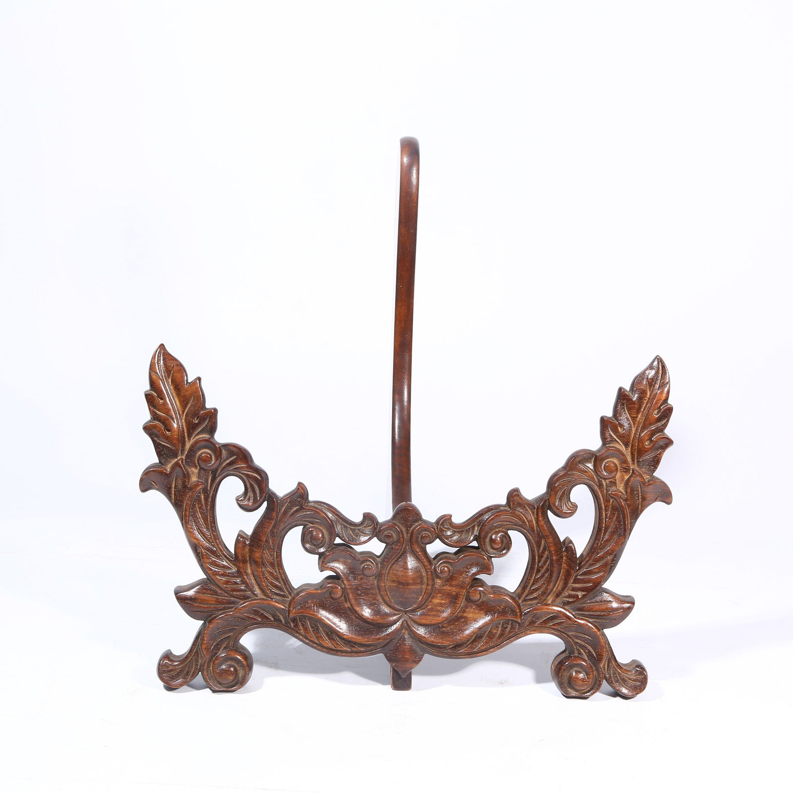A HUANGHUALI WOOD RACK WITH INTERTWINED LOTUS PATTERN (1 of 9)