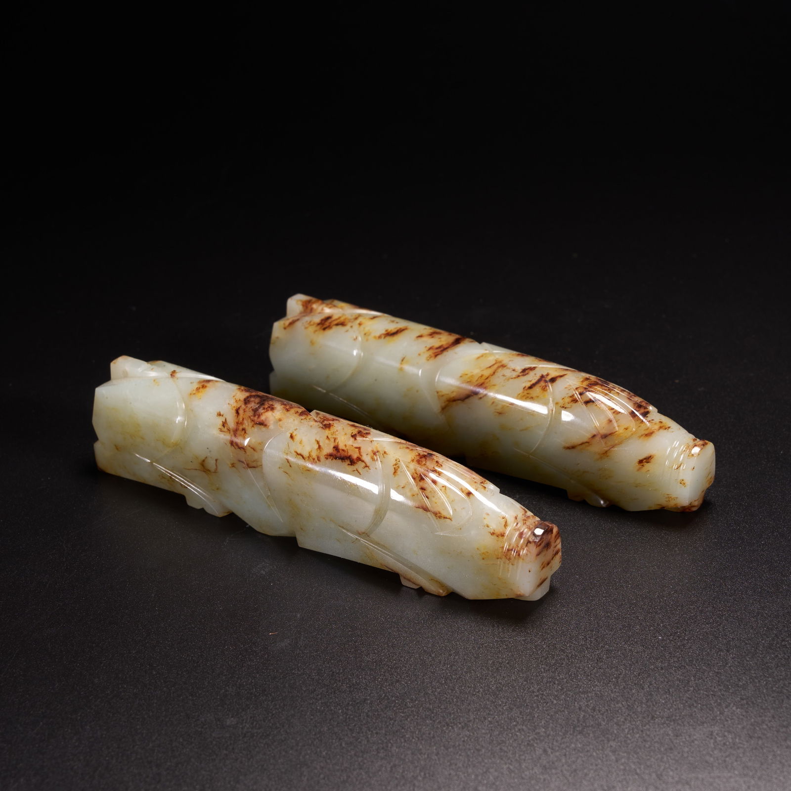 A SET OF HIGH-ANTIQUITY JADE HAND-GRIP ORNAMENTS: Set of High-Antiquity Jade Hand-Grip Ornaments