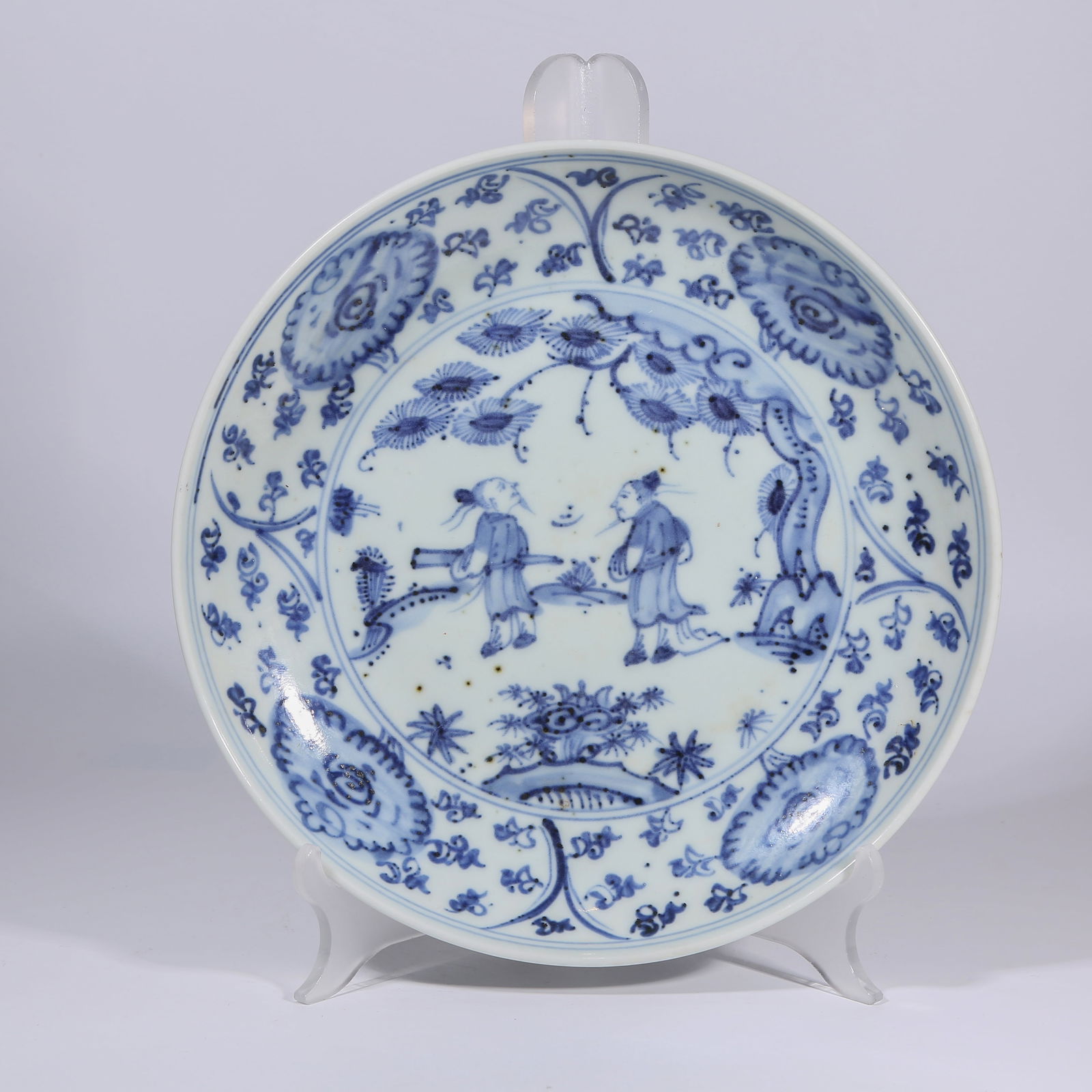 A BLUE-AND-WHITE PLATE WITH "SCHOLAR BENEATH PINE TREES" SCENE: Blue-and-White Plate with "Scholar beneath Pine Trees" Scene
