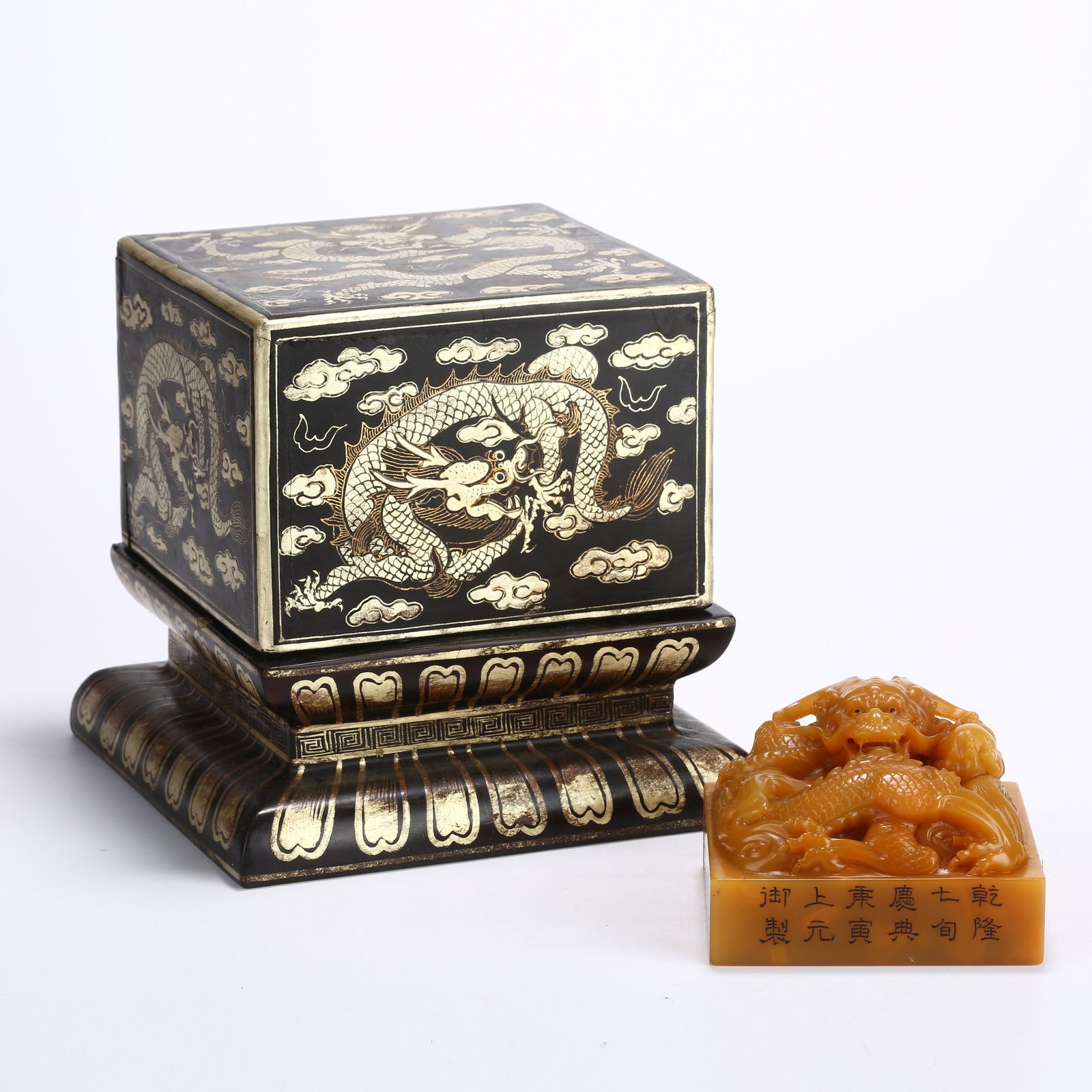 A SHOUSHAN TIANHUANG STONE SEAL WITH DRAGON KNOB: Shoushan Tianhuang stone seal with dragon knob
