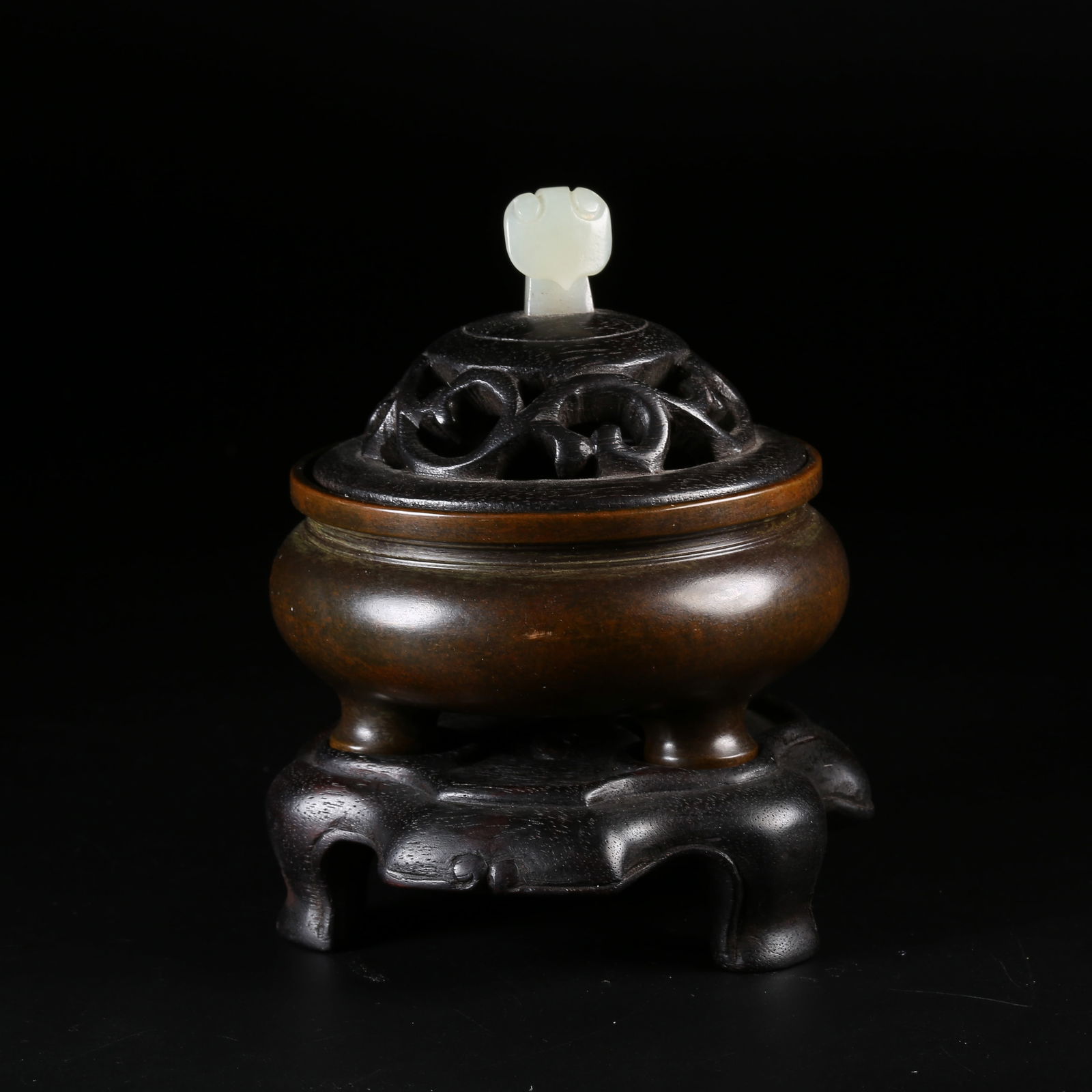 A BRONZE TRIPOD INCENSE BURNER WITH HETIAN JADE RUYI-SHAPED FINIAL (1 of 9)