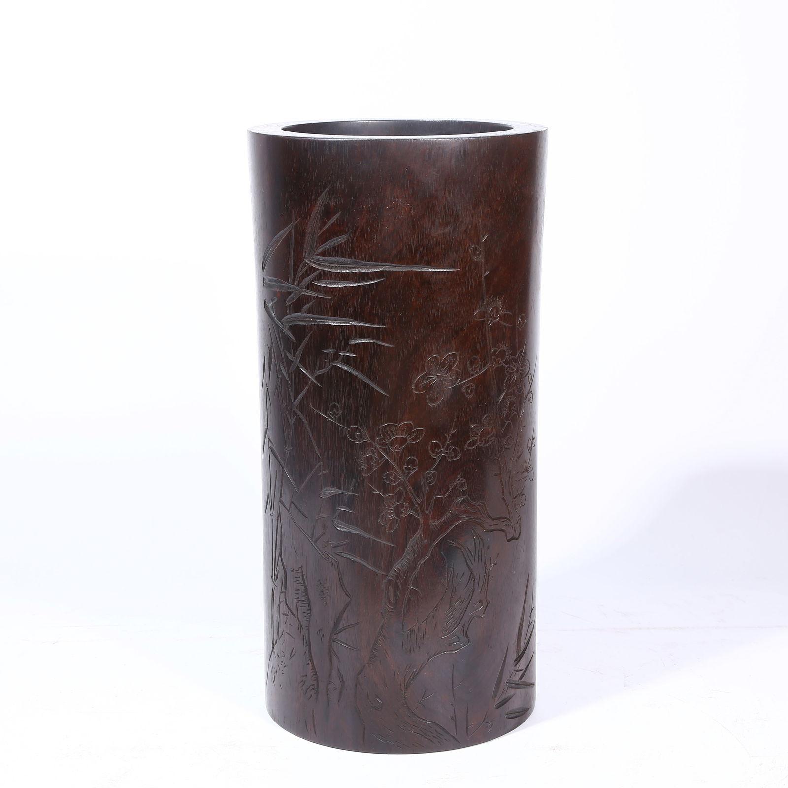 A ZITAN WOOD BRUSH POT WITH ORCHID AND BAMBOO DESIGN: Zitan Wood Brush Pot with Orchid and Bamboo Design