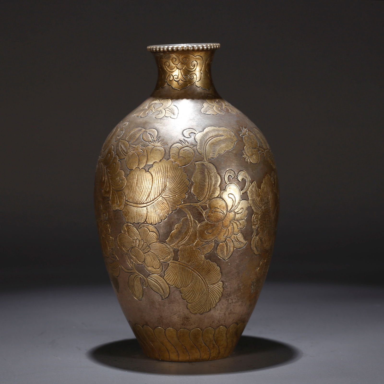 A GILT BRONZE VASE WITH FLORAL PATTERN (1 of 10)