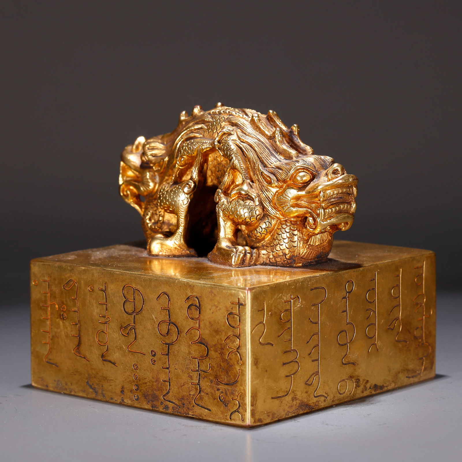 A GILT BRONZE SEAL WITH DOUBLE DRAGON KNOB (1 of 10)