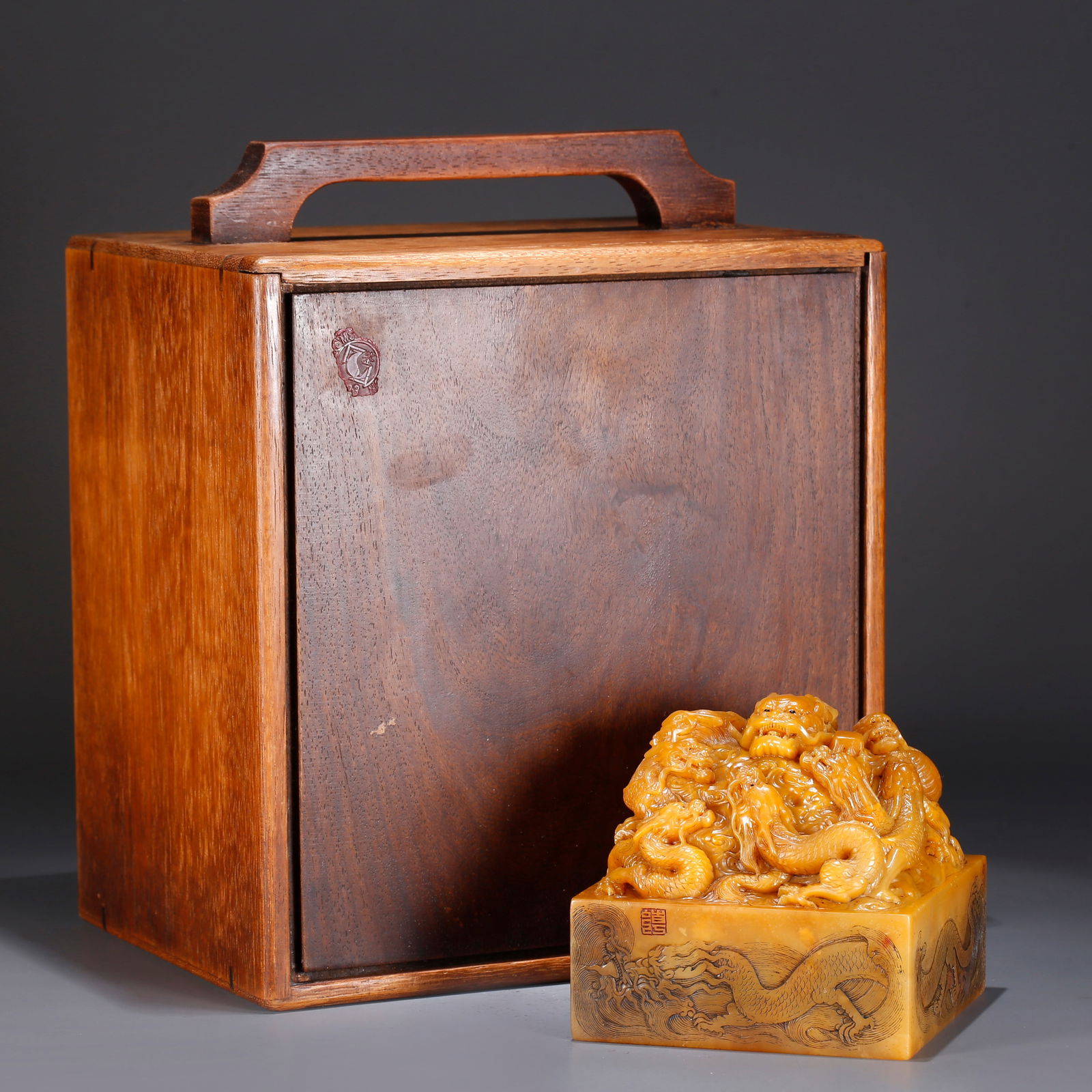 A SHOUSHAN TIANHUANG STONE SEAL WITH DRAGON KNOB: Shoushan Tianhuang stone seal with dragon knob