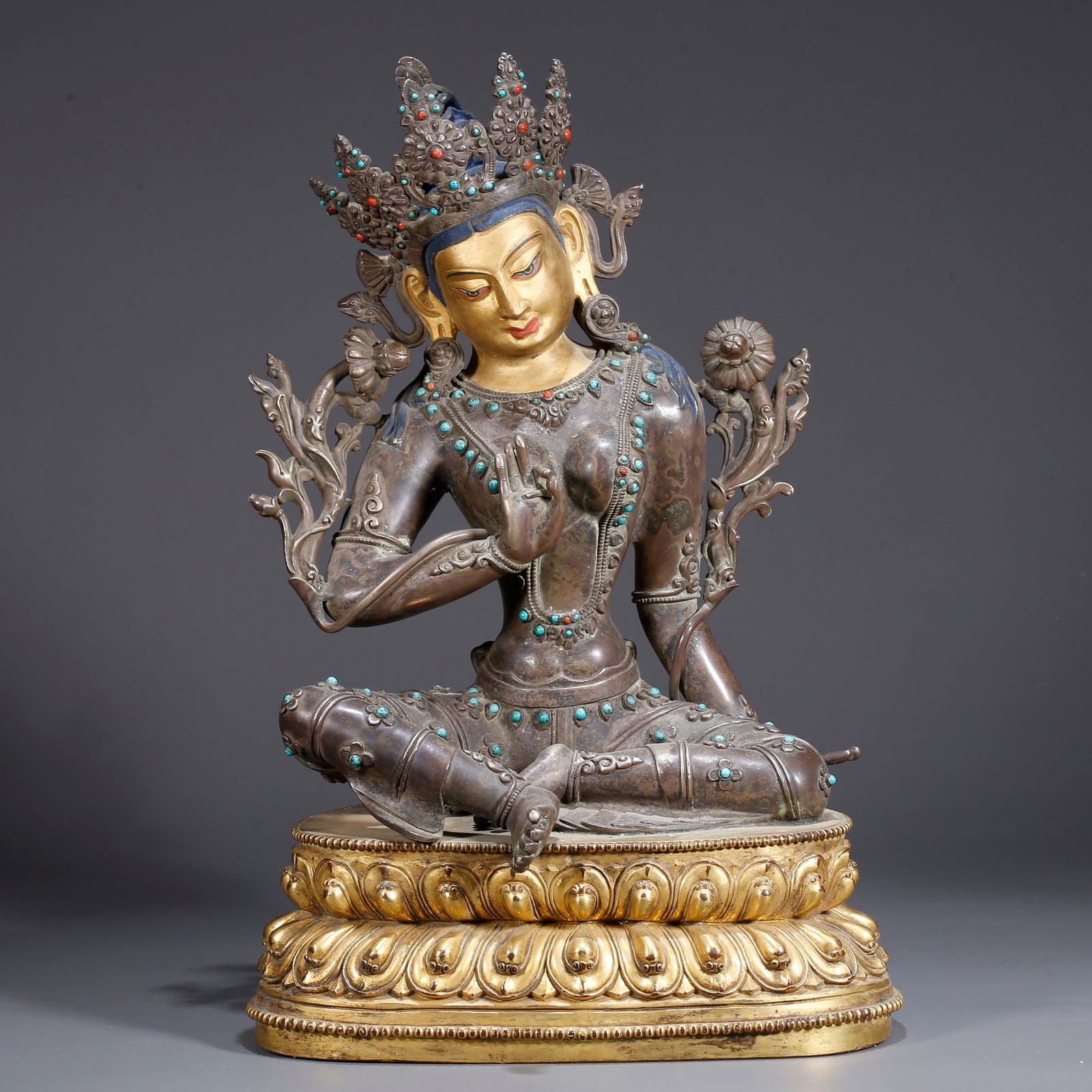 A GILDED SILVER TARA STATUE (1 of 9)