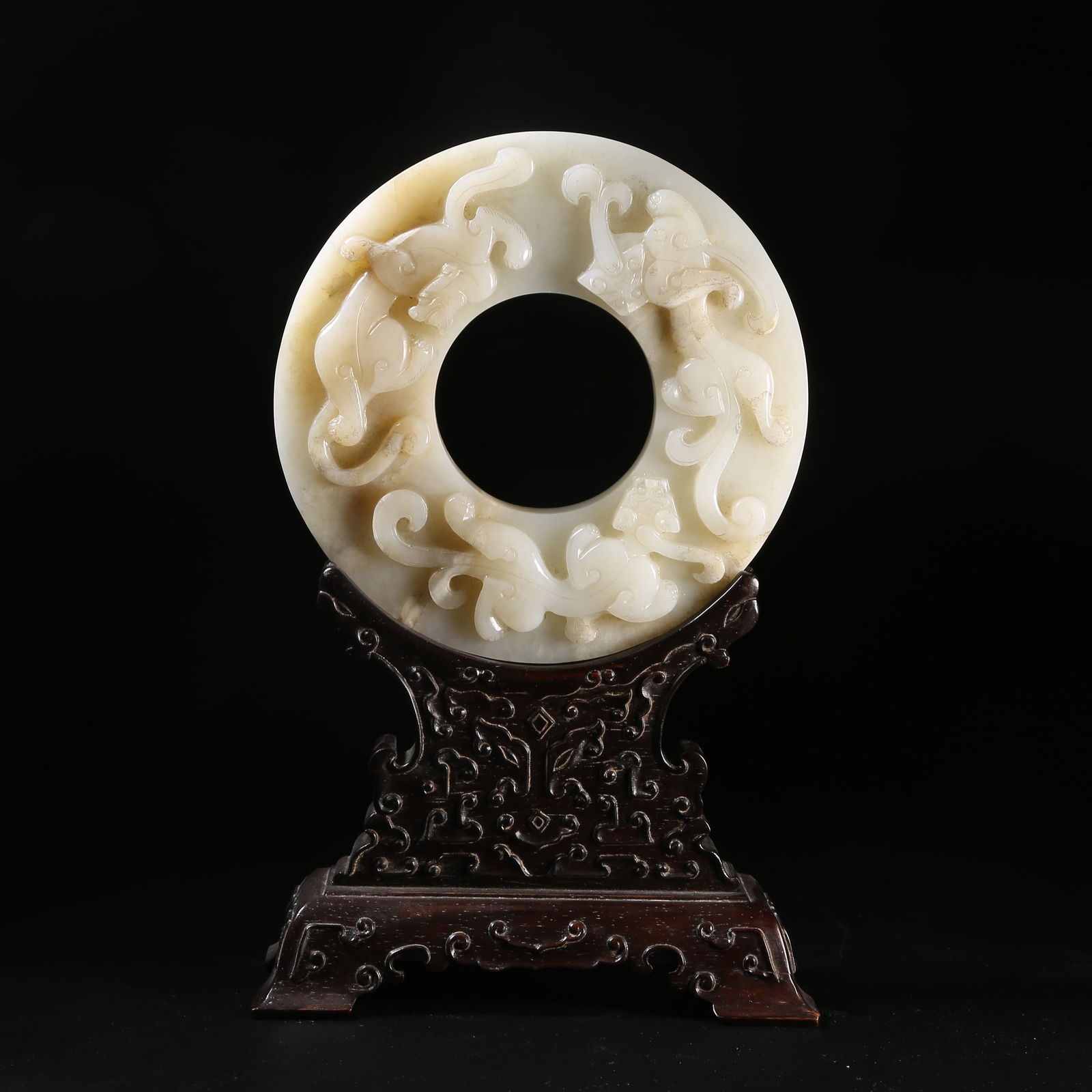 A QING DYNASTY HETIAN WHITE JADE BI WITH CHILONG: Qing Dynasty Hetian White Jade Bi with Chilong