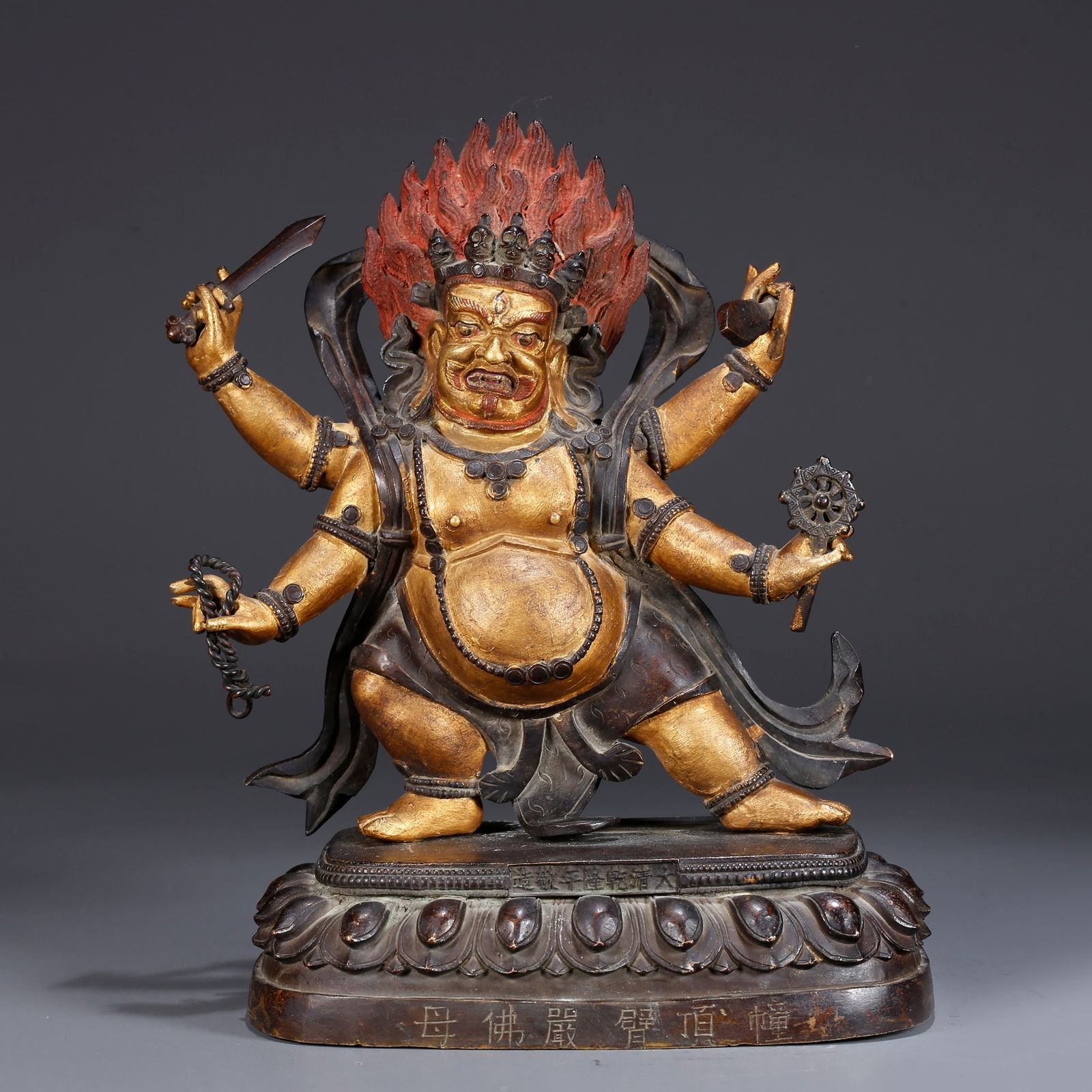 A GILDED BRONZE STATUE OF FOUR-ARMED MAHAKALA (1 of 9)