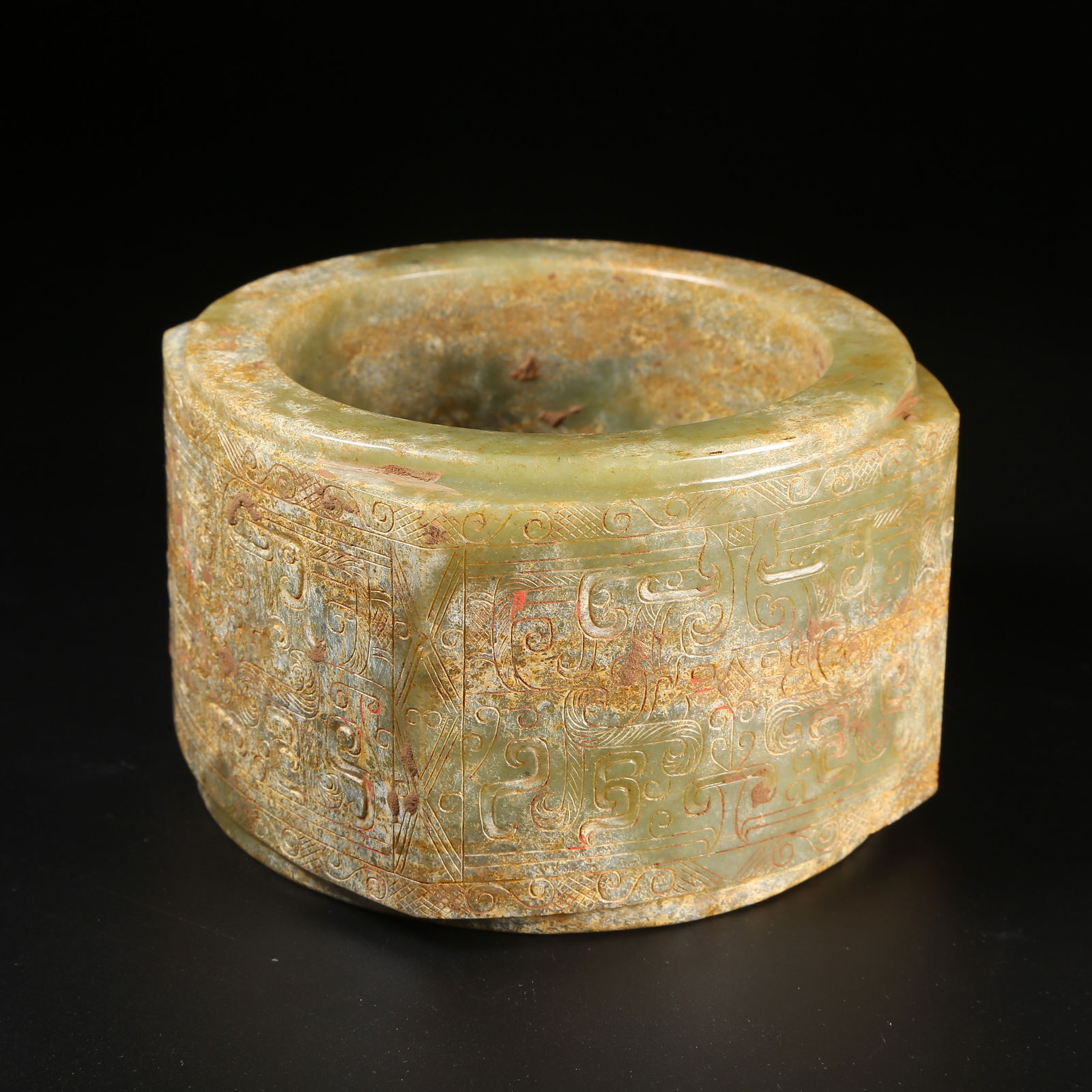 A PRE-HAN ANCIENT JADE CONG WITH BEAST-FACE PATTERN (1 of 9)