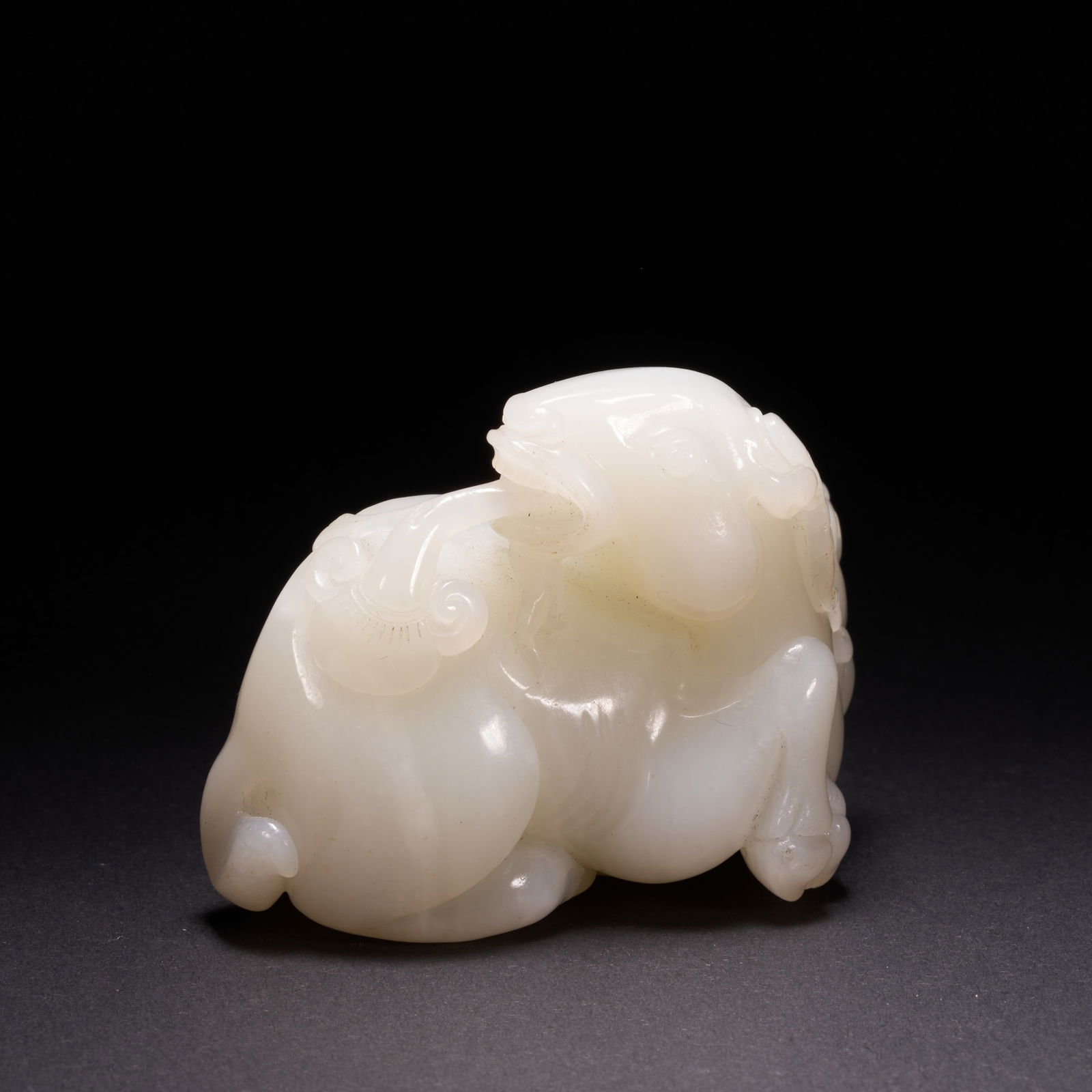 A HETIAN JADE "MOTHER AND CHILD RAM" ORNAMENT, QING DYNASTY (1 of 9)