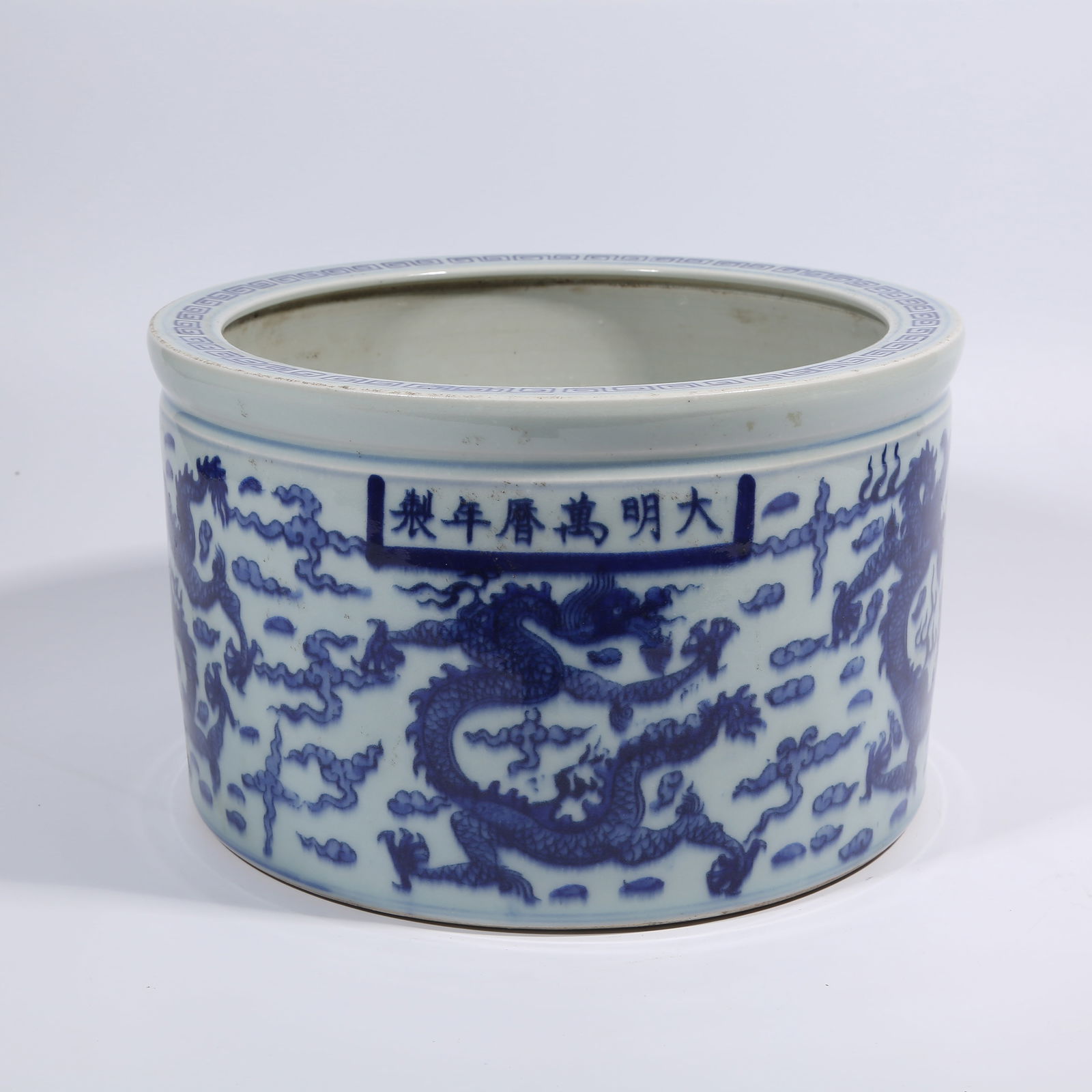A BLUE-AND-WHITE BRUSH POT WITH CLOUD AND DRAGON PATTERN (1 of 9)