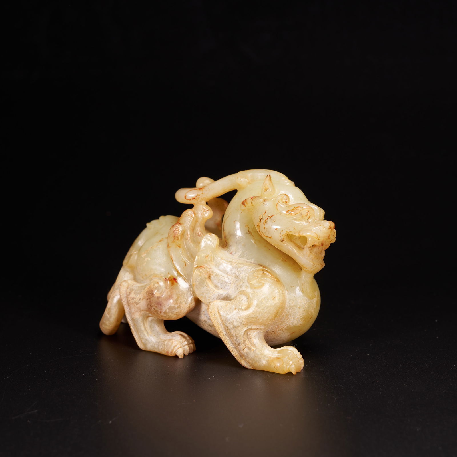 A HIGH-ANTIQUITY JADE BIXIE (PROTECTIVE BEAST) ORNAMENT (1 of 10)