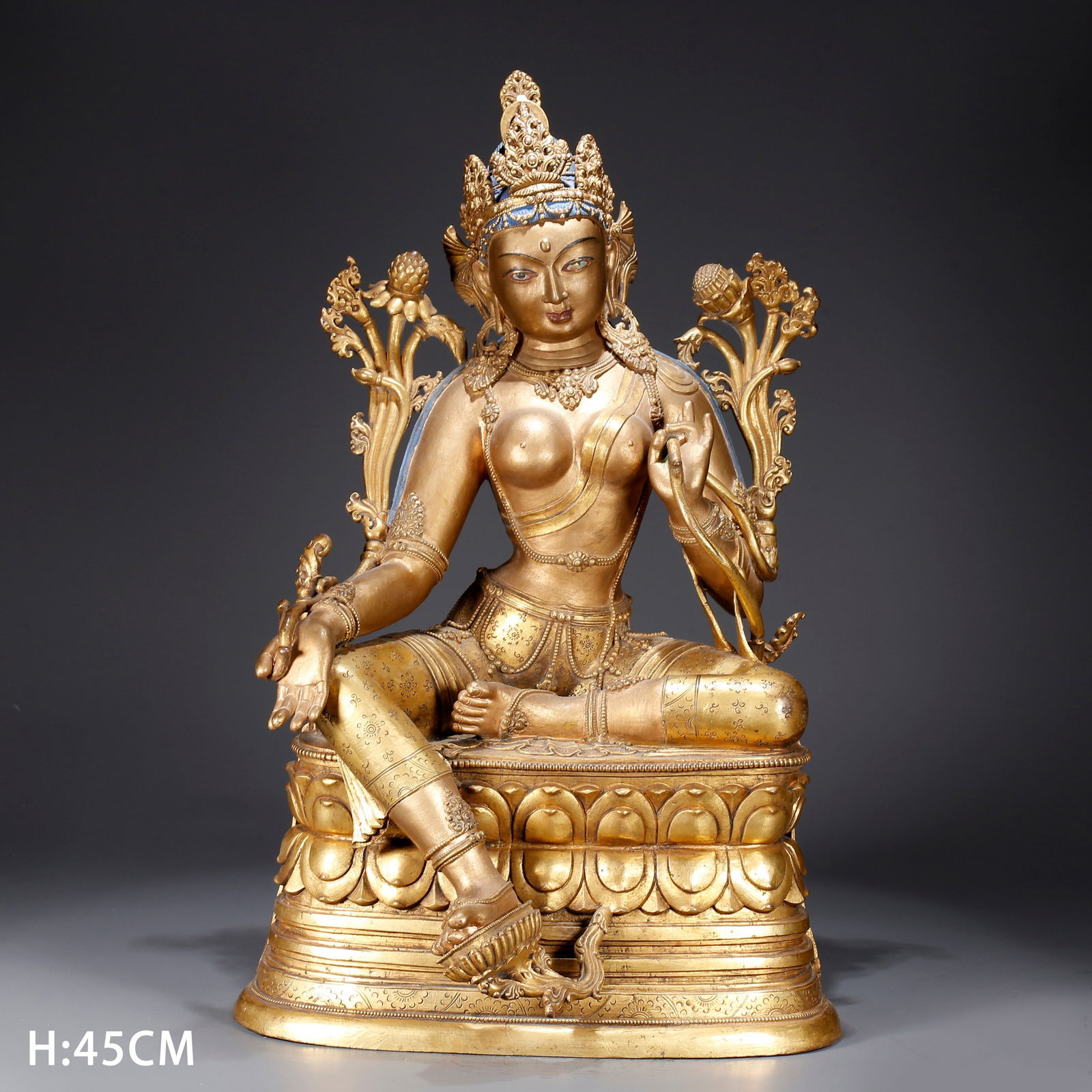 A GILDED BRONZE STATUE OF GREEN TARA (1 of 10)