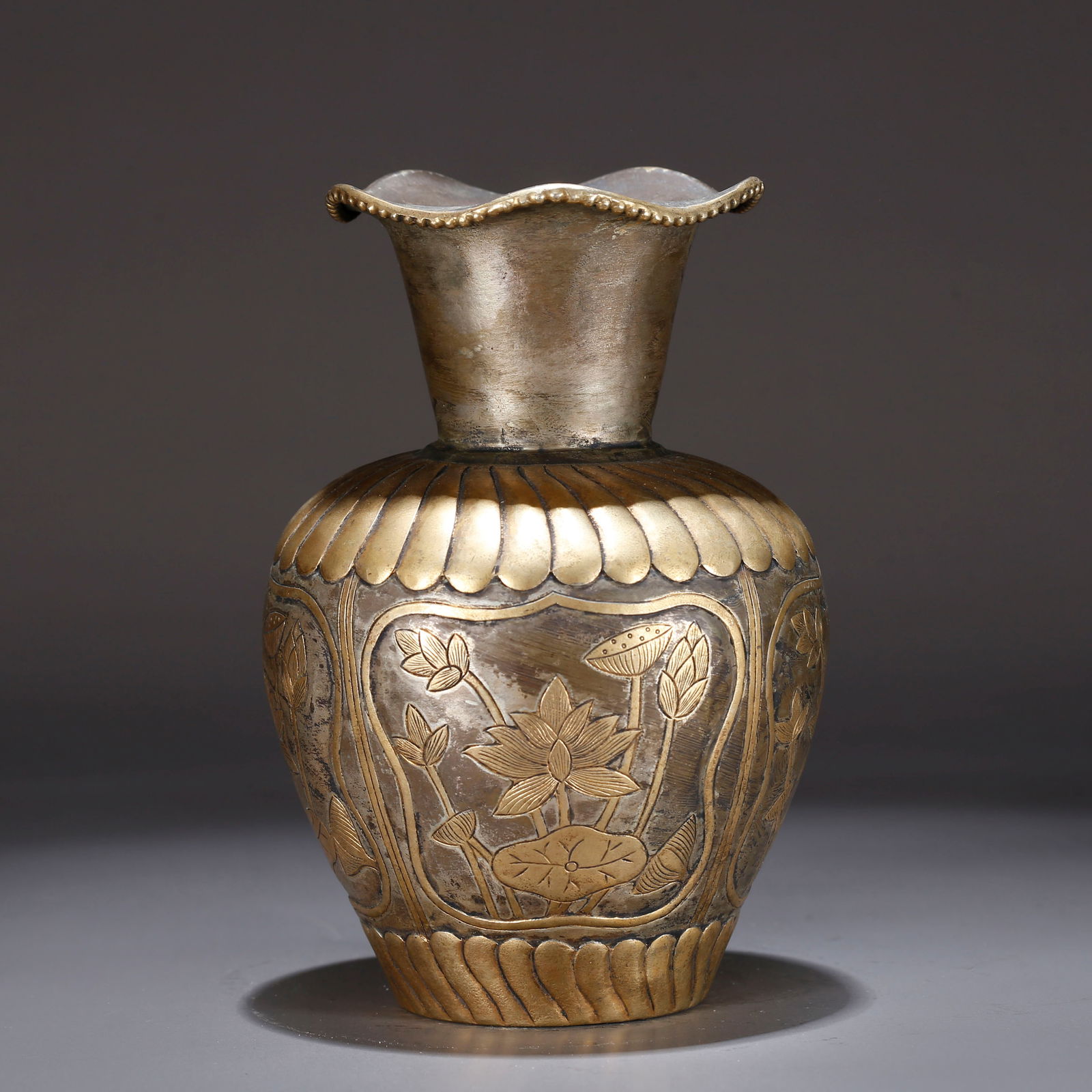 A GILT BRONZE VASE WITH FLORAL PATTERN (1 of 9)