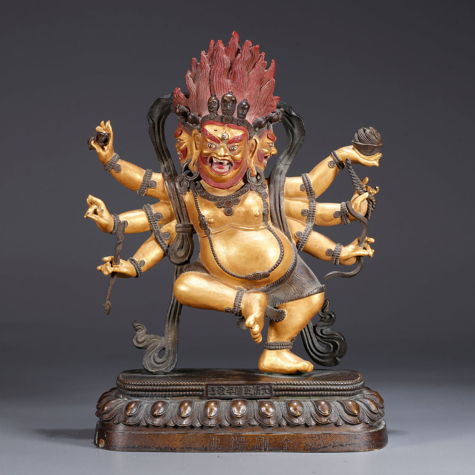 A GILDED BRONZE STATUE OF SIX-ARMED MAHAKALA (1 of 9)