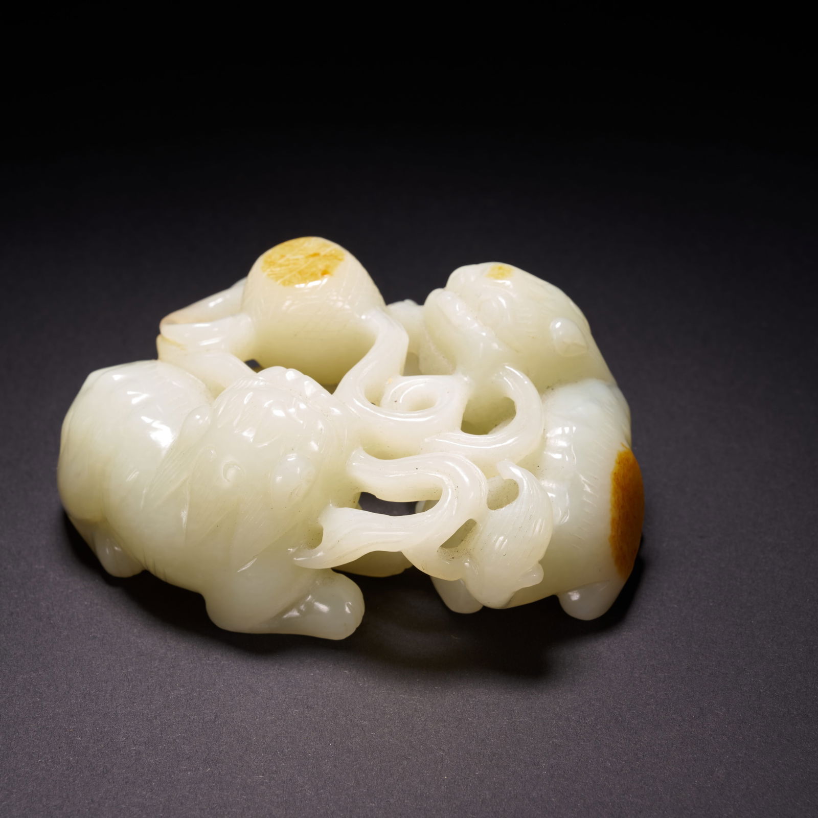 A HETIAN JADE "MOTHER-AND-CHILD BEAST" ORNAMENT, QING DYNASTY (1 of 9)