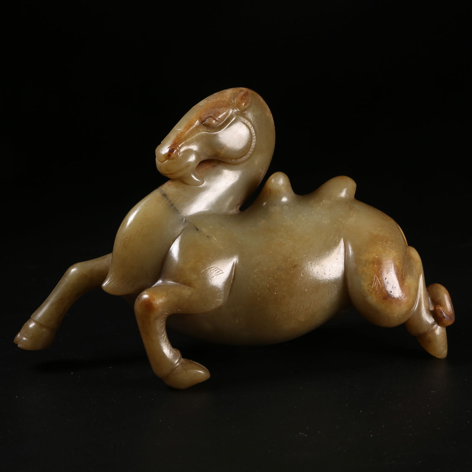 A HAN DYNASTY ANCIENT JADE CAMEL FIGURINE (1 of 8)