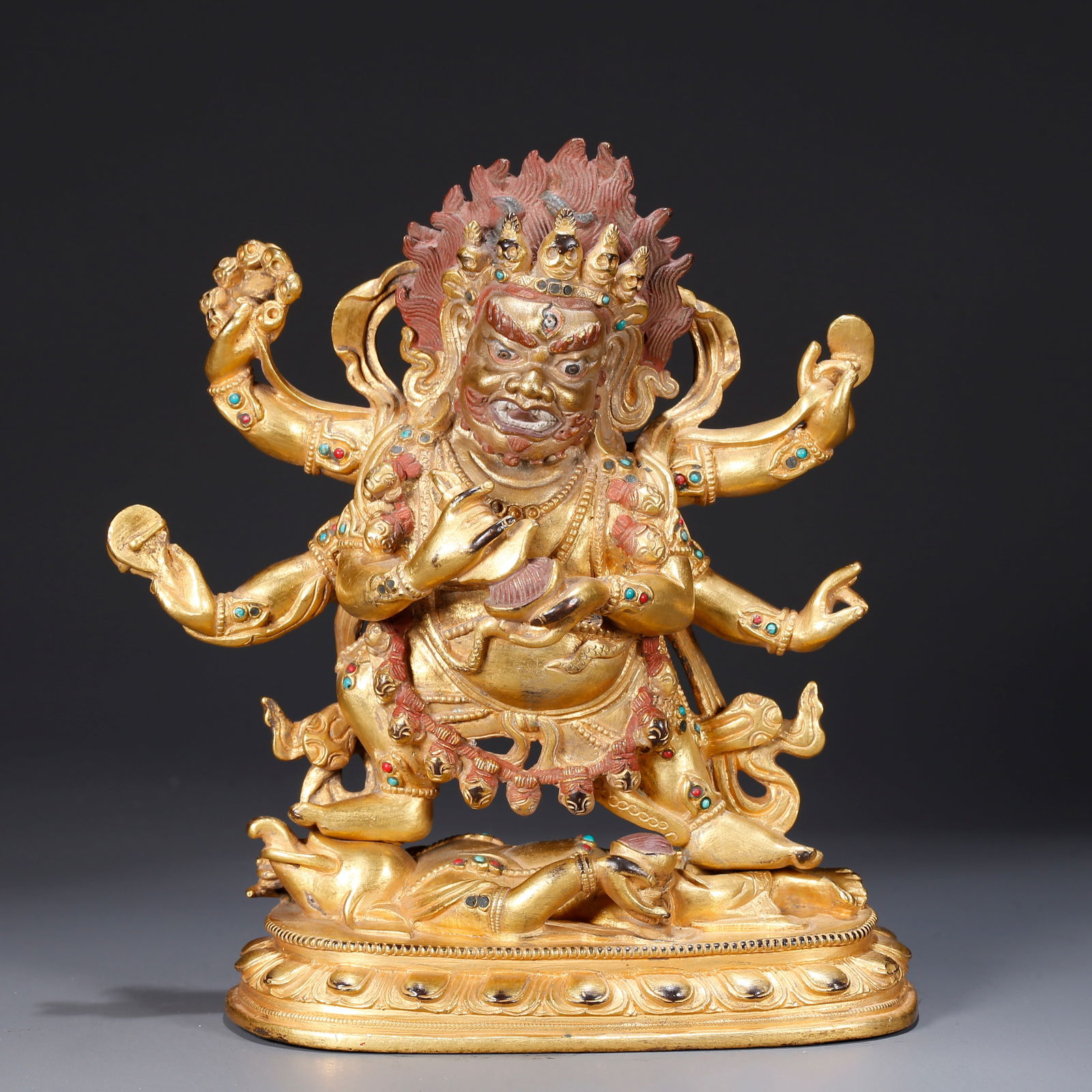 A GILDED BRONZE STATUE OF SIX-ARMED MAHAKALA (1 of 9)