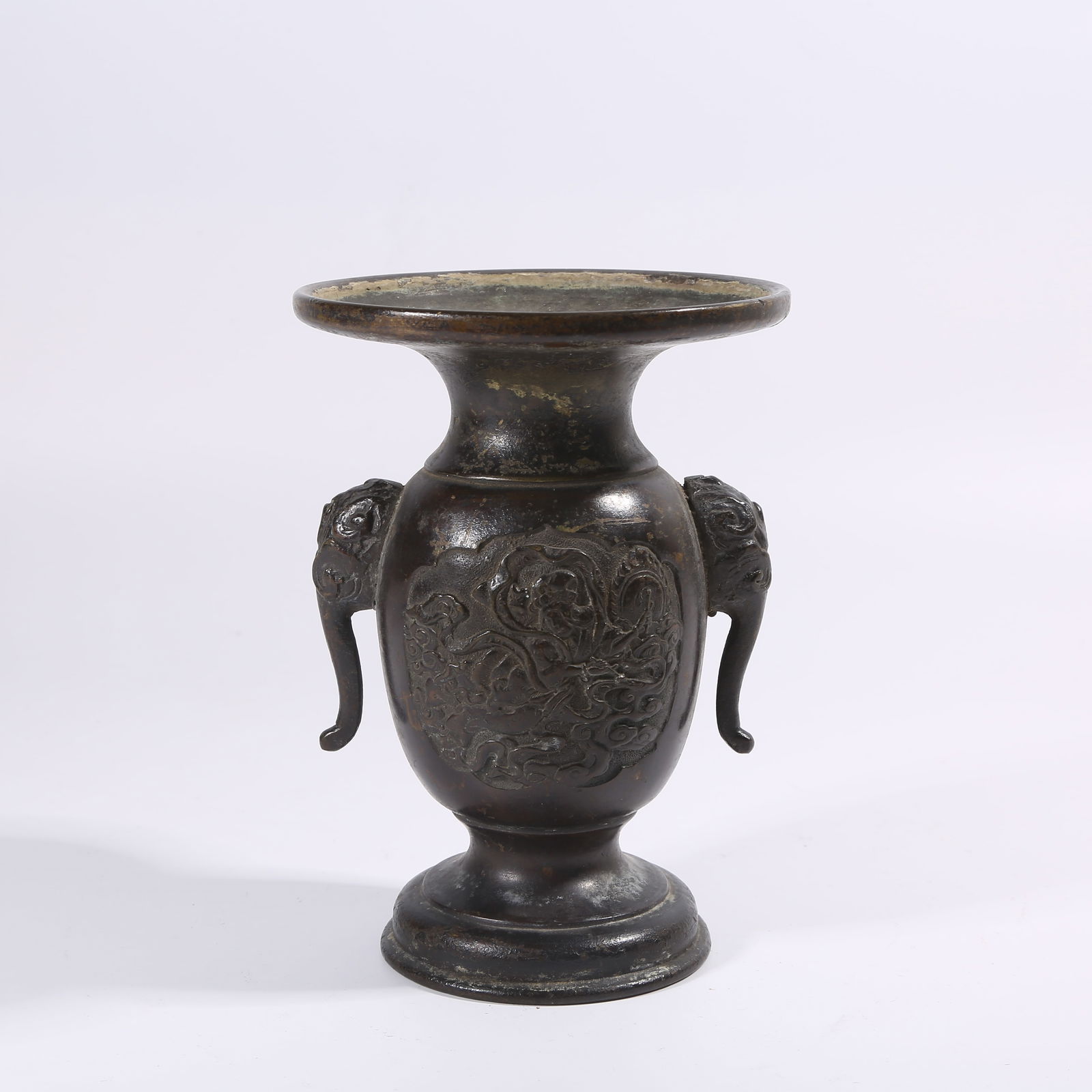 A QING DYNASTY BRONZE ELEPHANT-HANDLED FLOWER VASE: Qing Dynasty Bronze Elephant-Handled Flower Vase