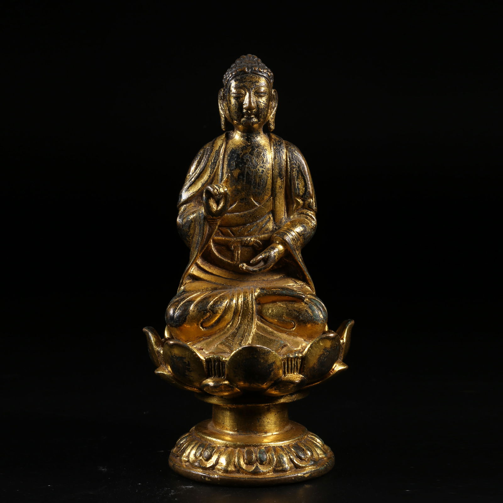 A GILT-BRONZE BUDDHA STATUE (1 of 8)