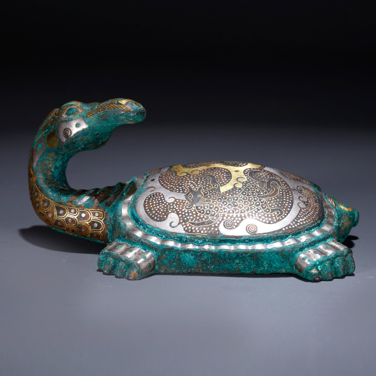 A BRONZE TURTLE-SHAPED ORNAMENT INLAID WITH GOLD AND SILVER: Bronze turtle-shaped ornament inlaid with gold and silver