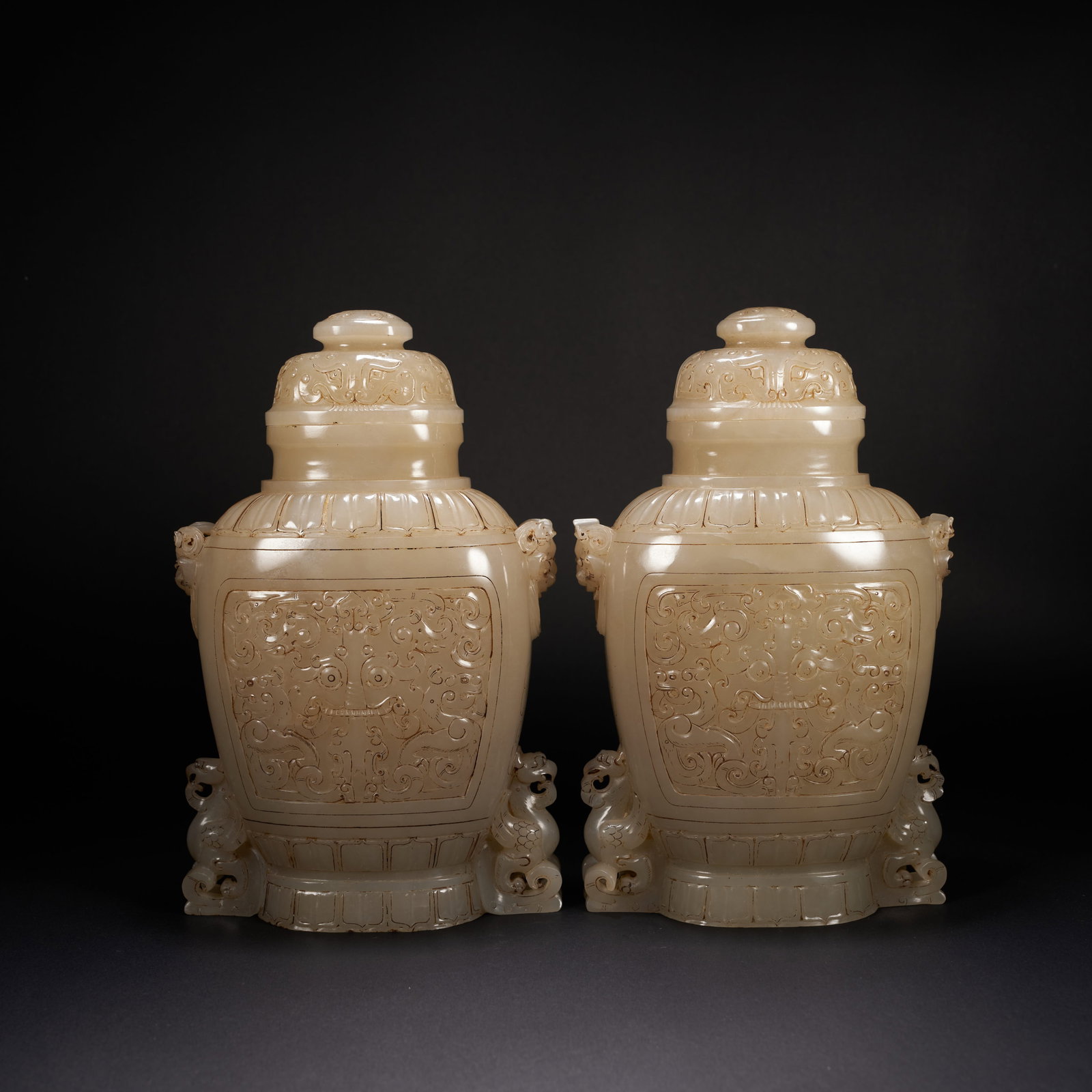 A A SET OF HETIAN JADE VASES WITH BEAST HANDLES AND TWIN PHOENIXES, HAN DYNASTY (1 of 8)