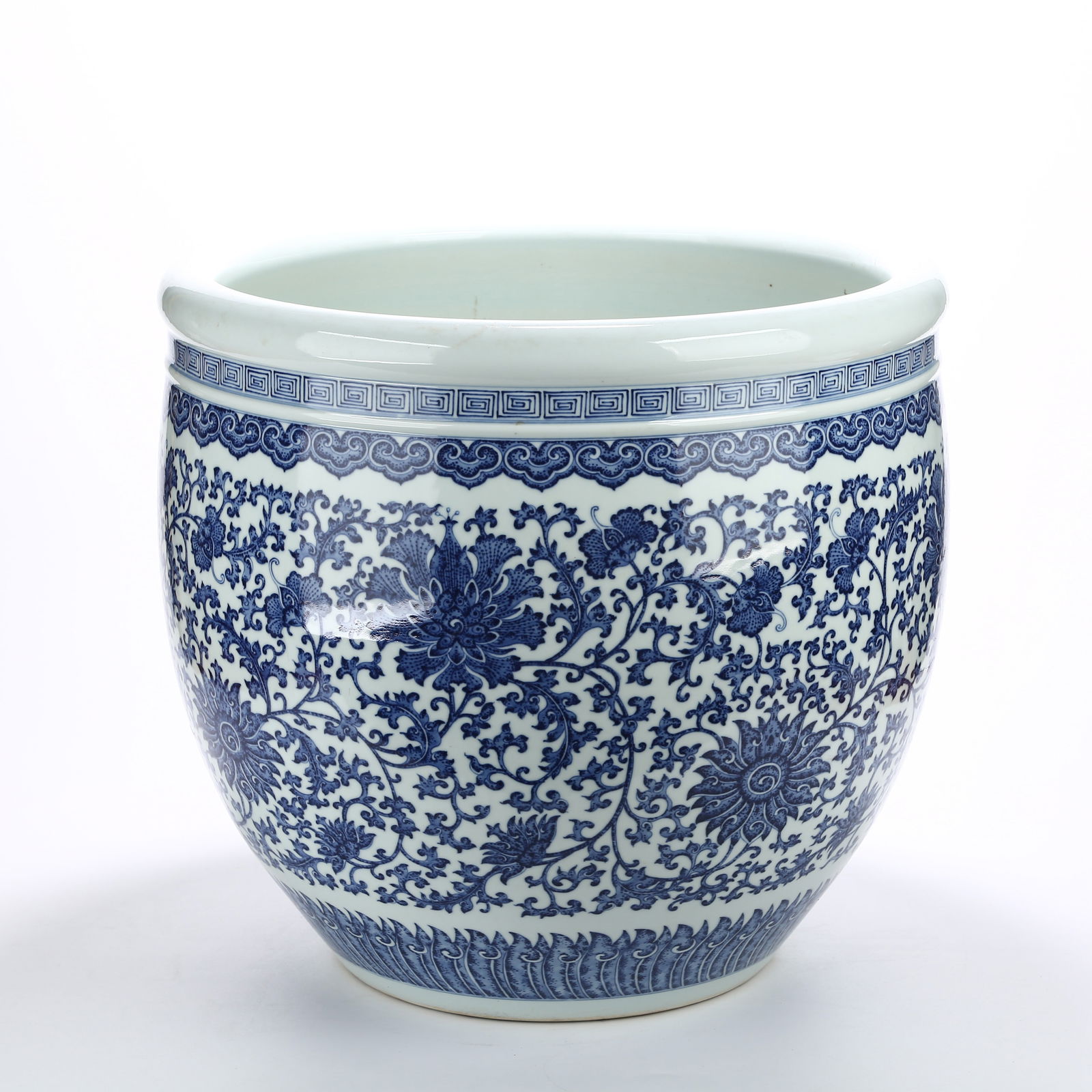 A BLUE AND WHITE LARGE JAR WITH SCROLLING FLORAL PATTERN (1 of 12)