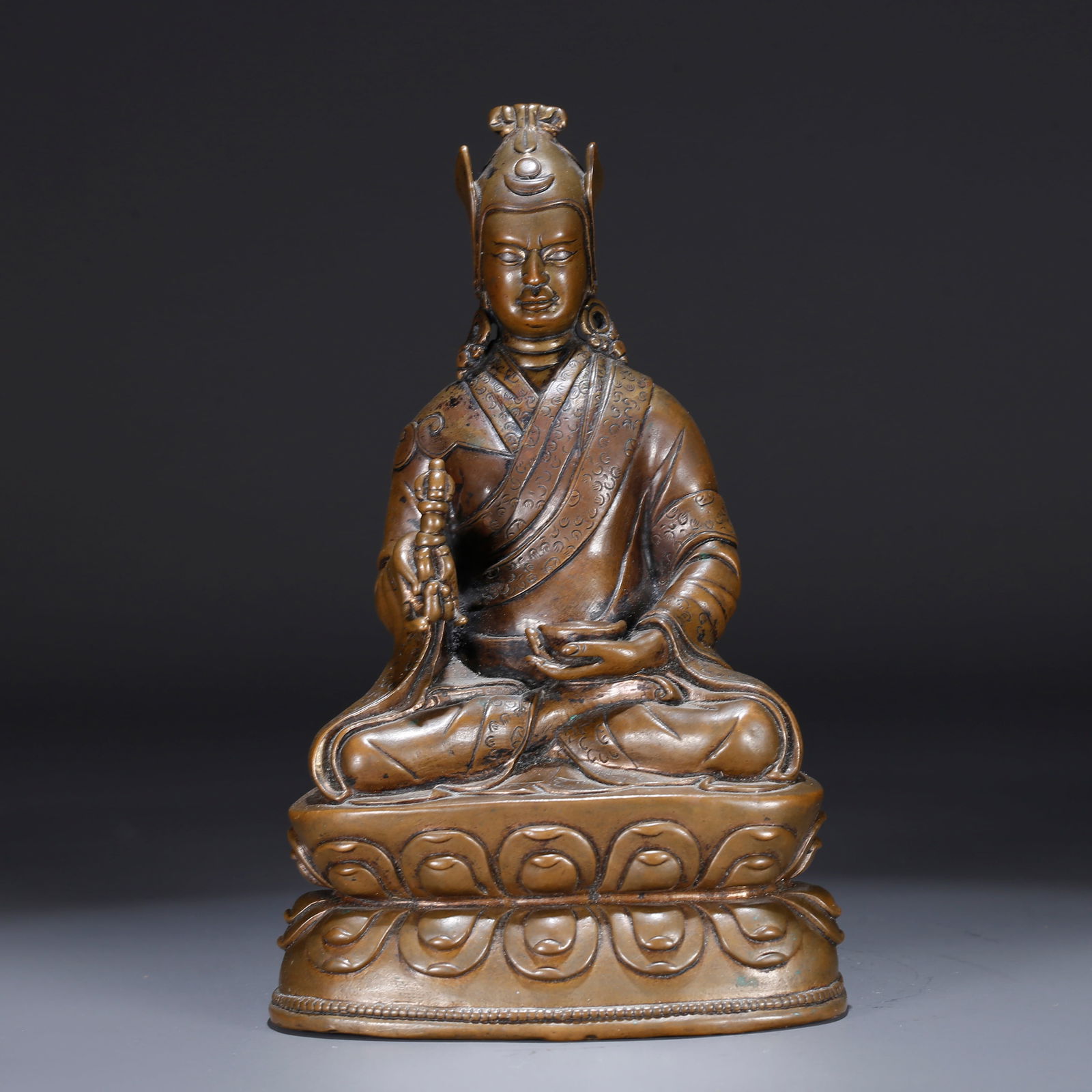 A BRONZE STATUE OF A SPIRITUAL TEACHER (LAMA) (1 of 10)