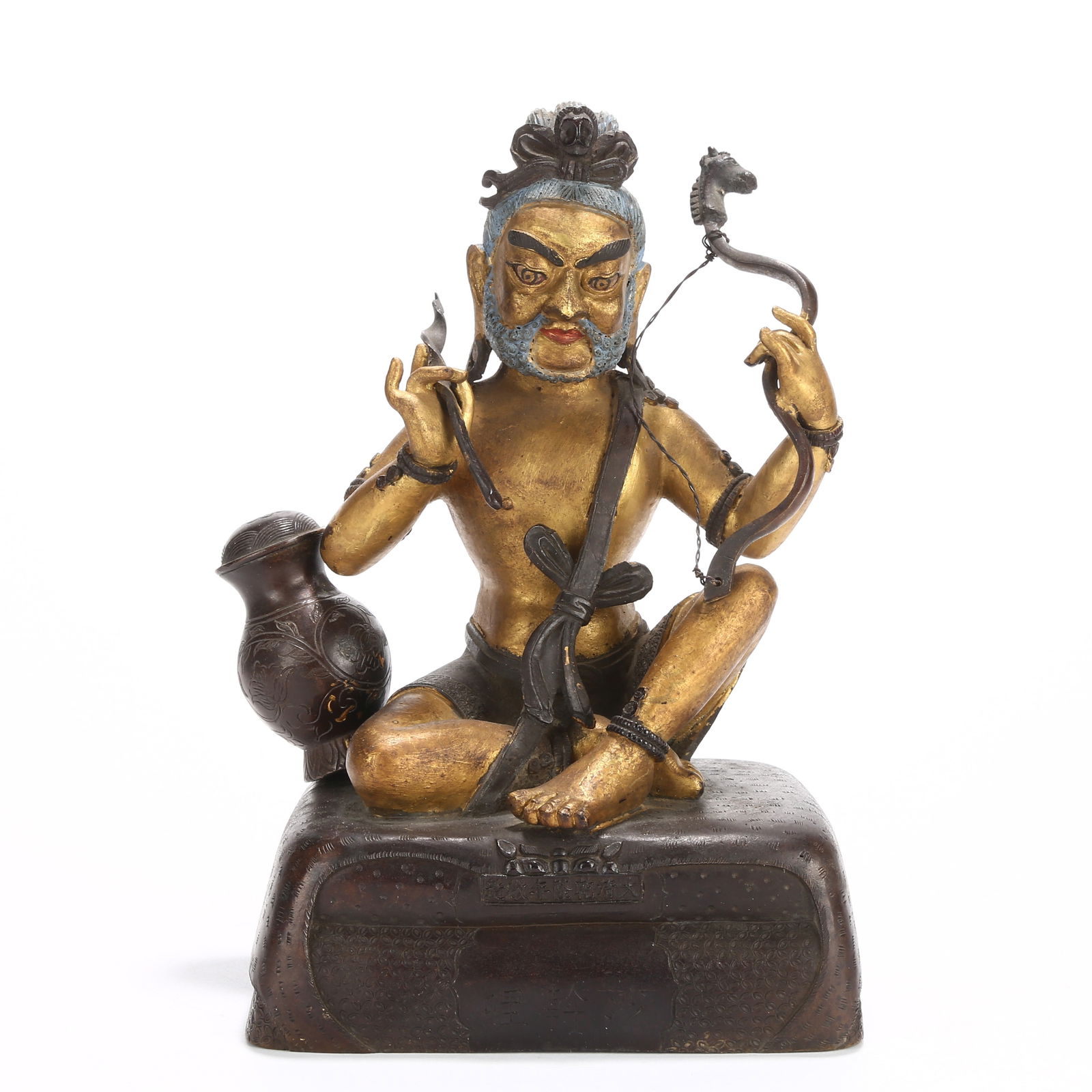 A BRONZE AND GILDED MAHASIDDHA STATUE: Bronze and Gilded Mahasiddha Statue
