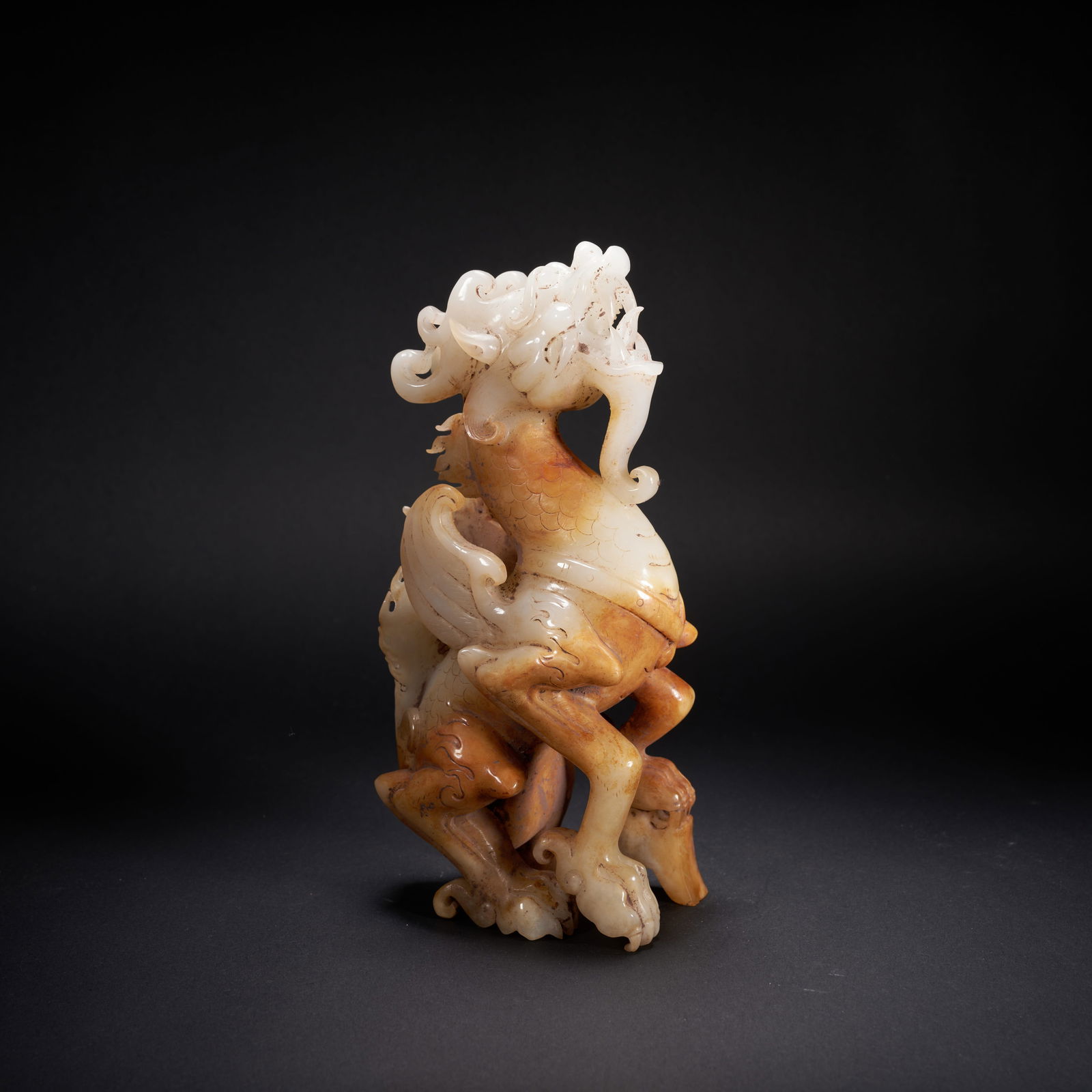 A HETIAN JADE DIVINE DRAGON ORNAMENT, HAN DYNASTY (1 of 9)