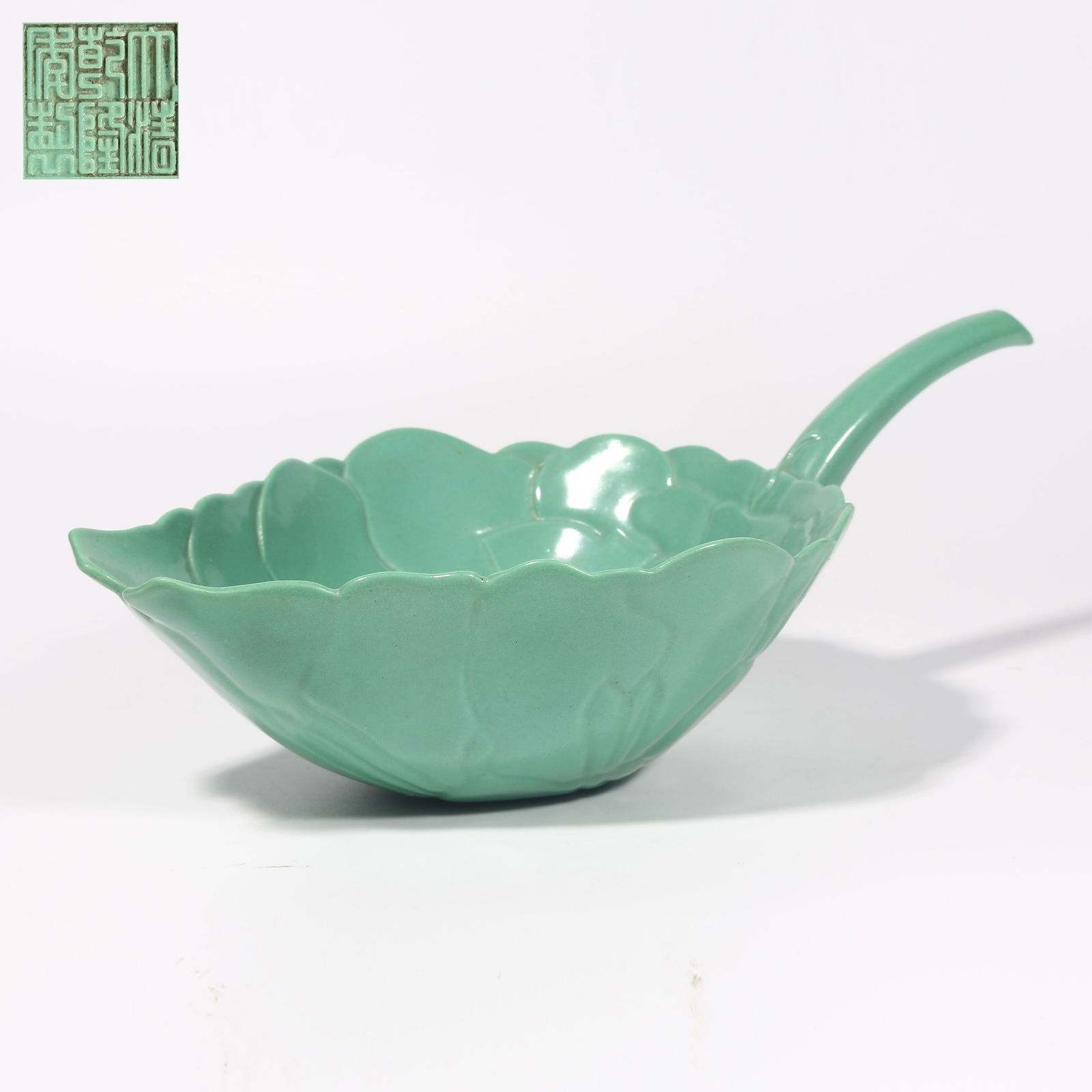 A TURQUOISE GREEN GLAZE AUTUMN CHARACTER PORCELAIN: Turquoise Green Glaze Autumn Character Porcelain