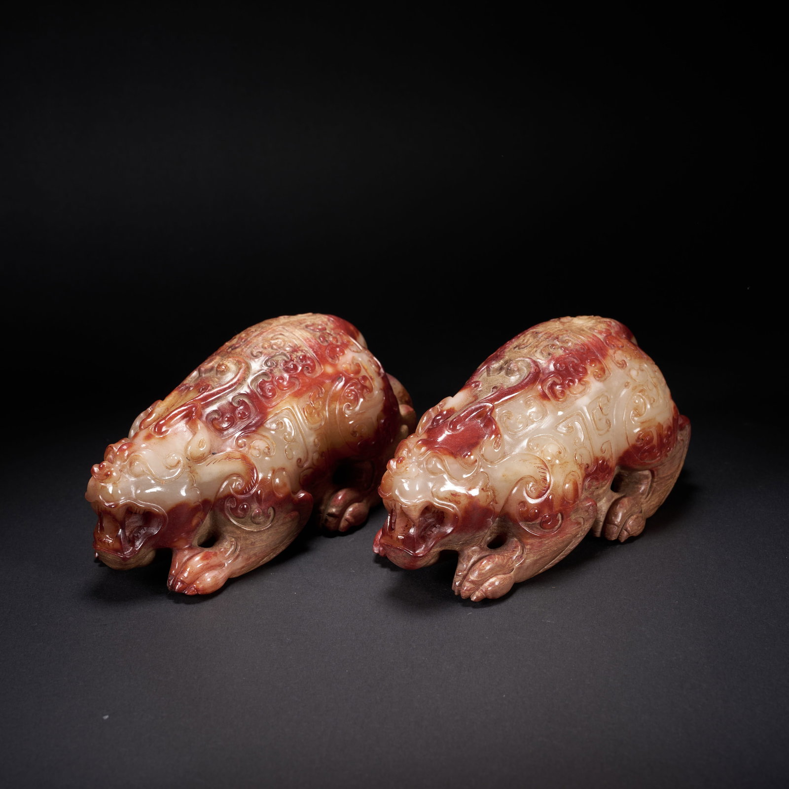 A SET OF HETIAN JADE AUSPICIOUS BEASTS, HAN DYNASTY (1 of 9)