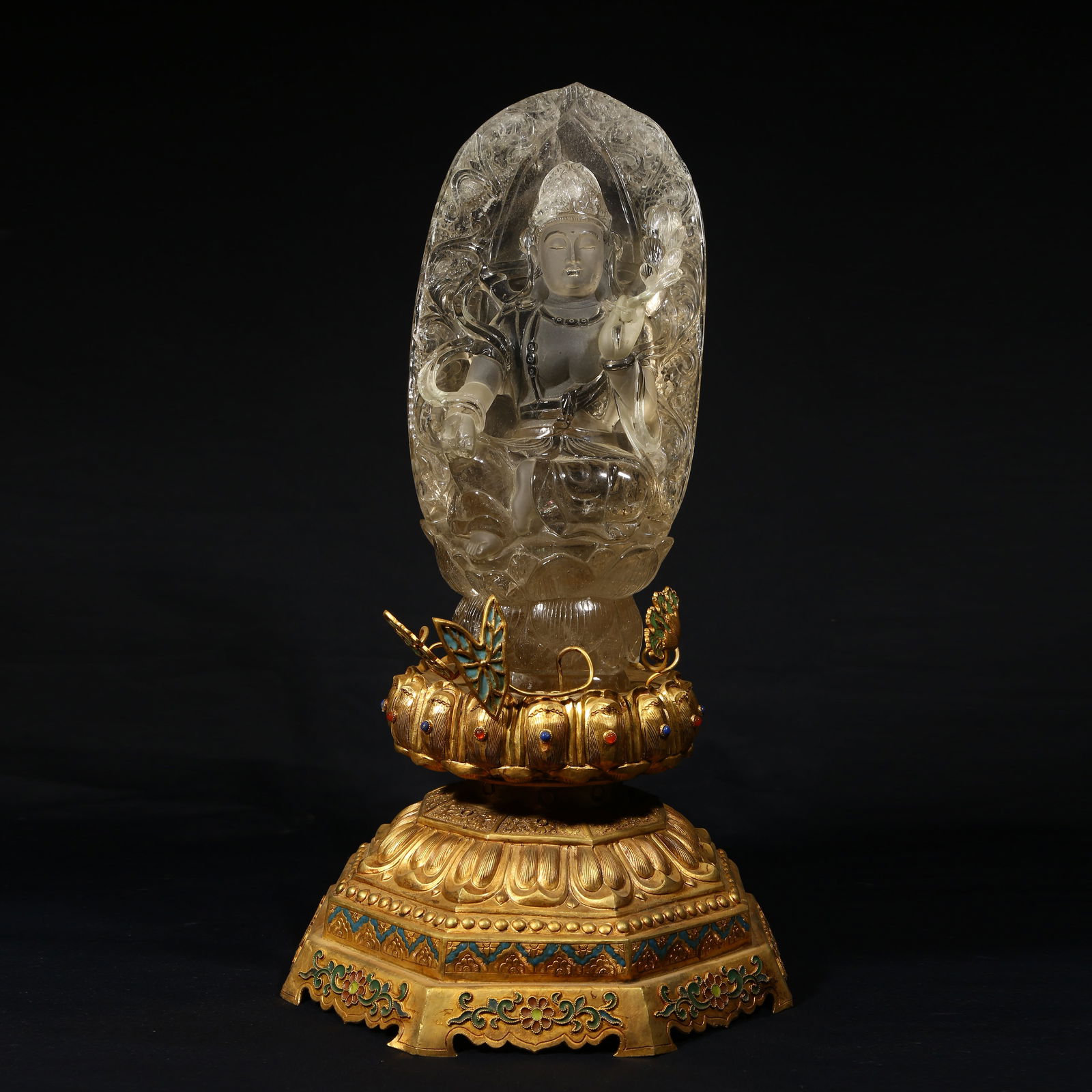 A CRYSTAL SEATED BODHISATTVA STATUE (1 of 9)