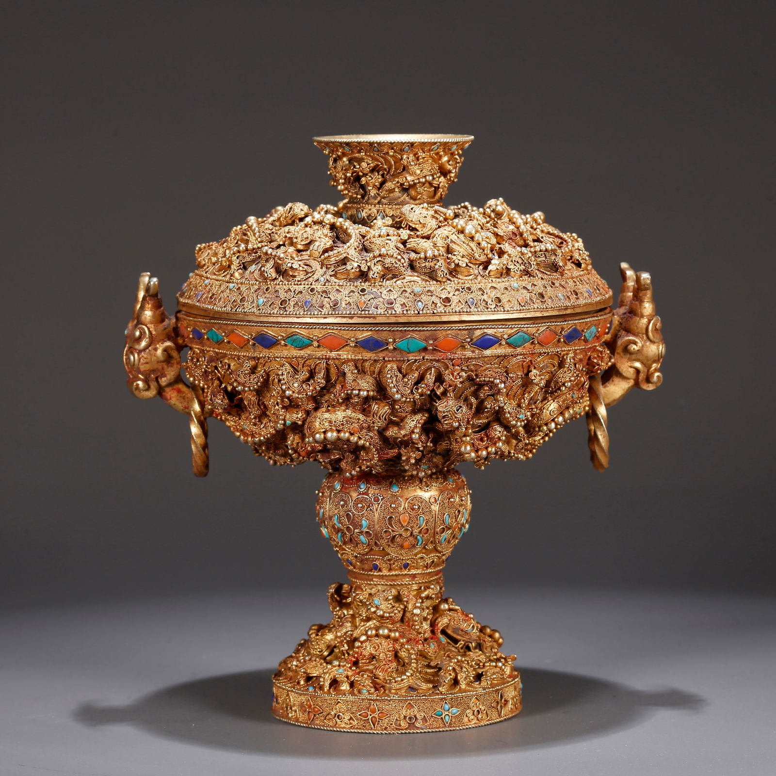 A GILT BRONZE DOUBLE-HANDLED HIGH-FOOTED CUP WITH DRAGON PATTERN (1 of 10)